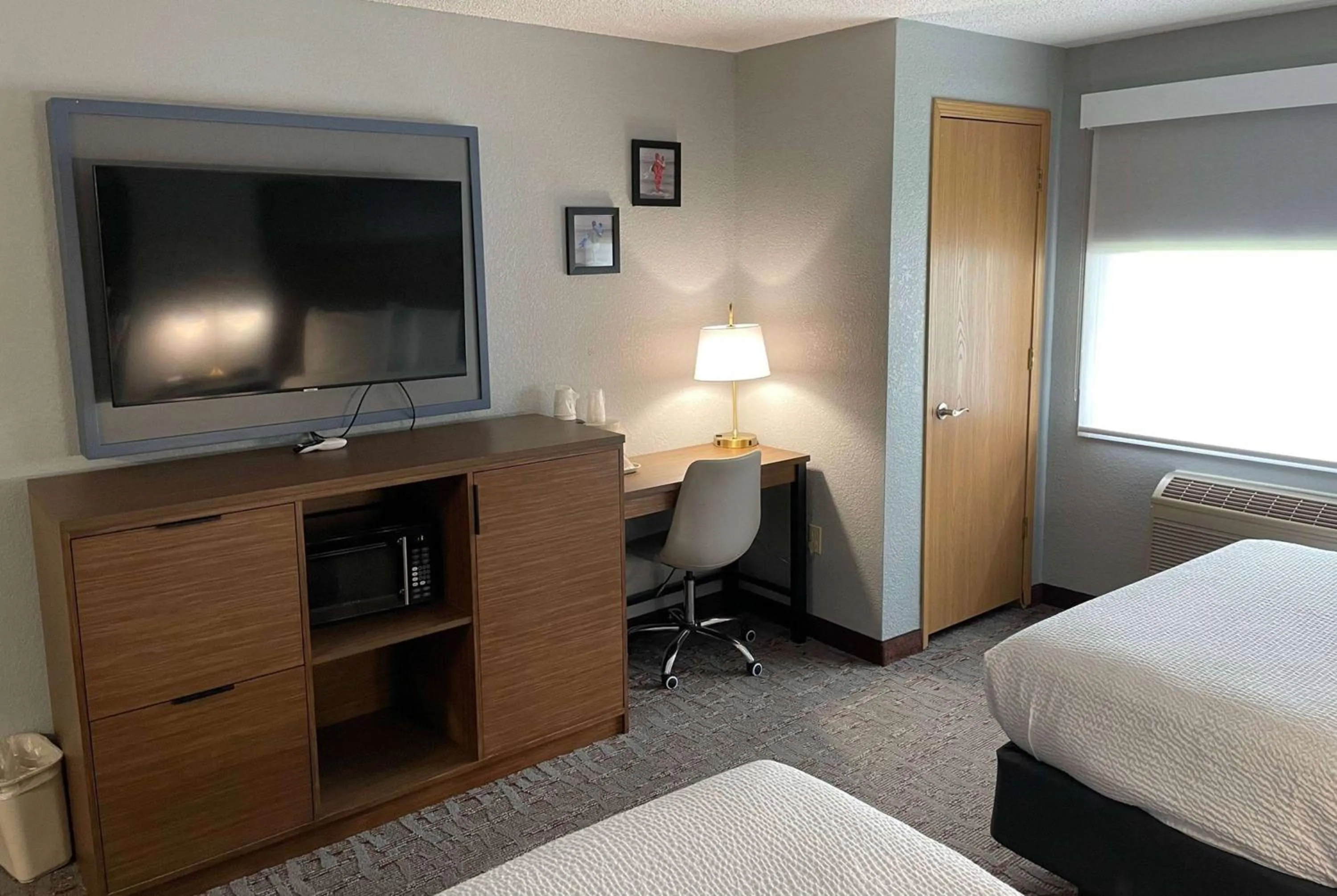 Photo of the whole room, Bed in AmericInn by Wyndham Ankeny/Des Moines