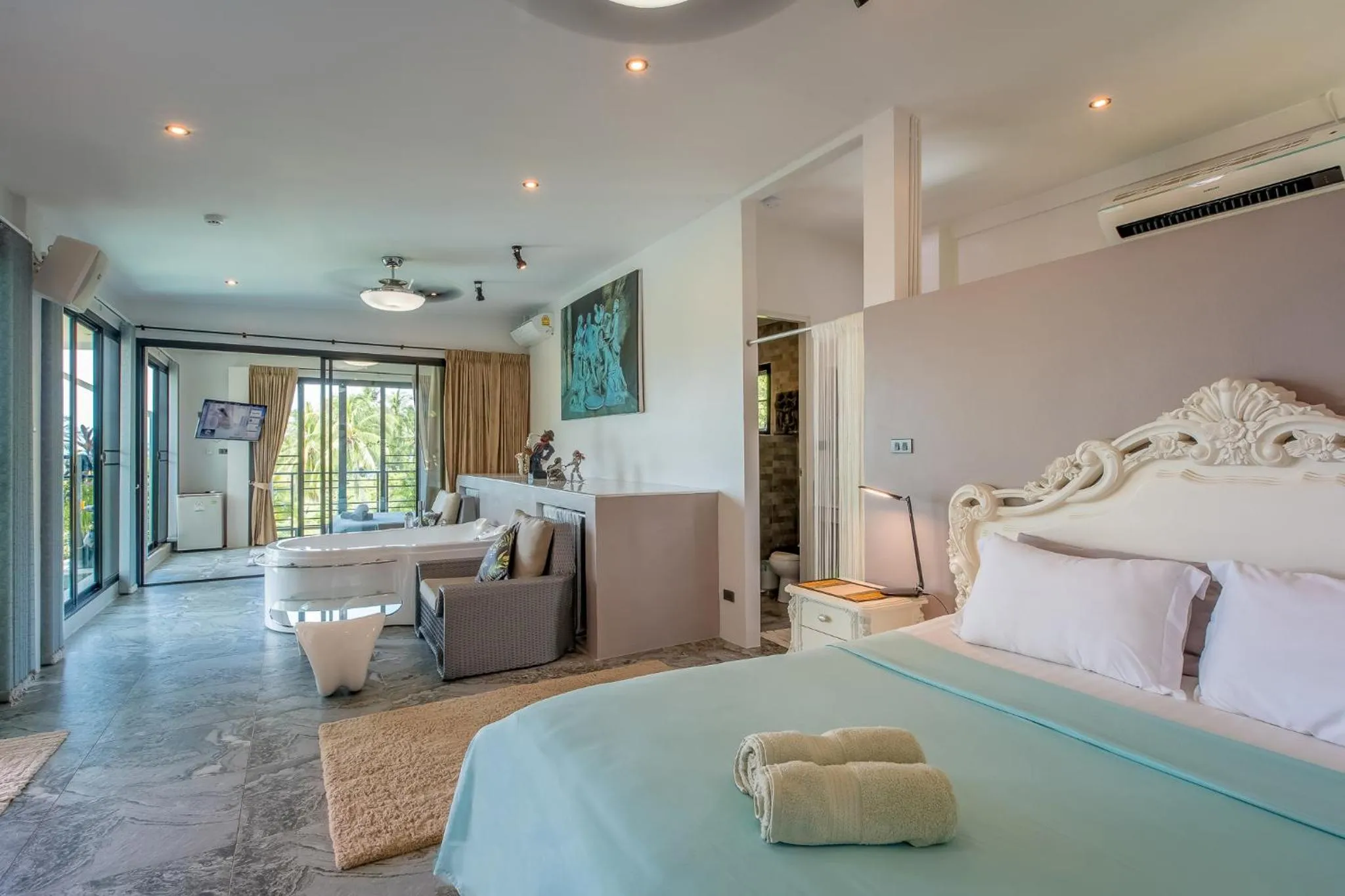 Bed in Penthouse Crystal Bay Apartments