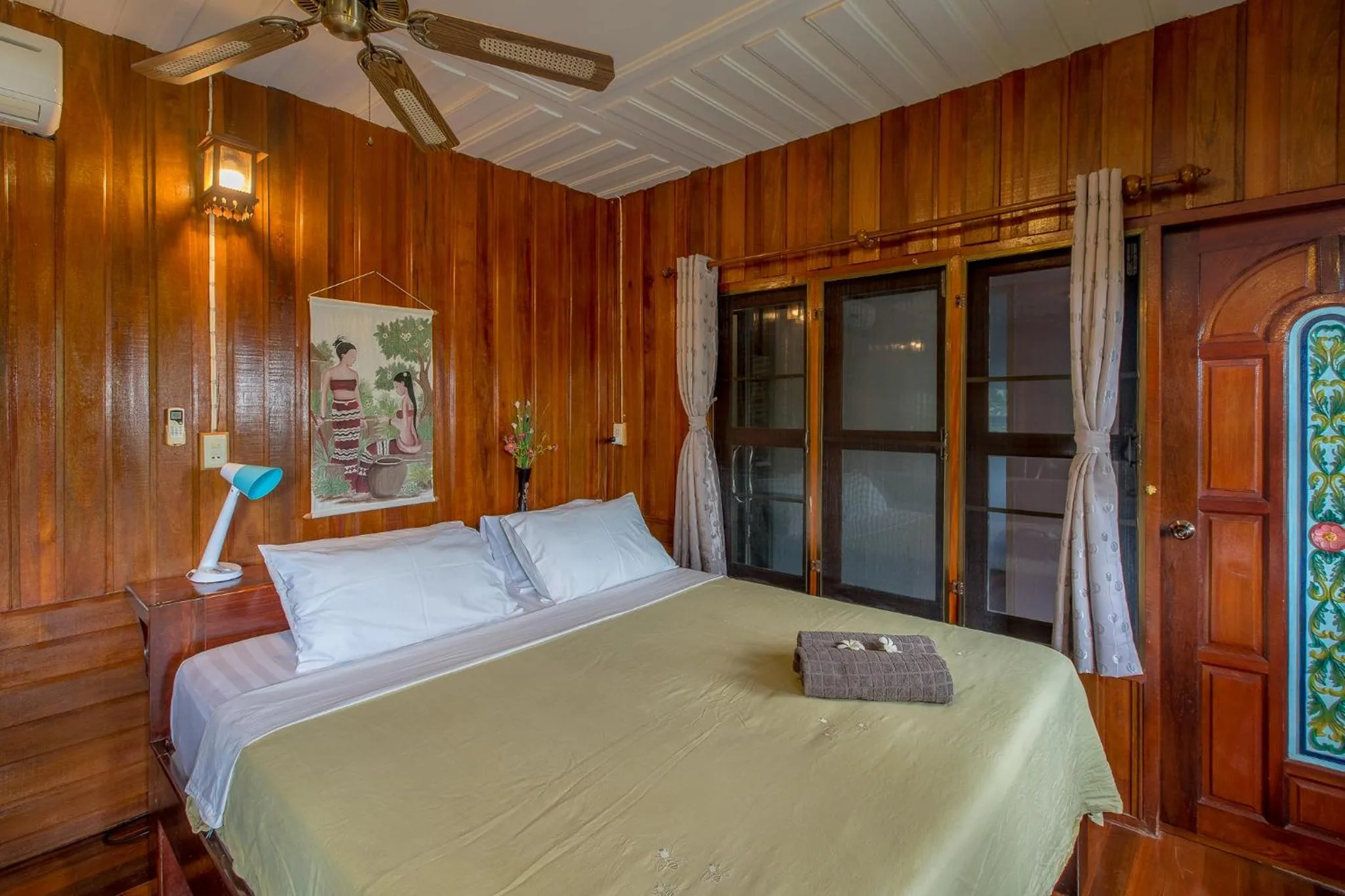 Bed in Penthouse Crystal Bay Apartments