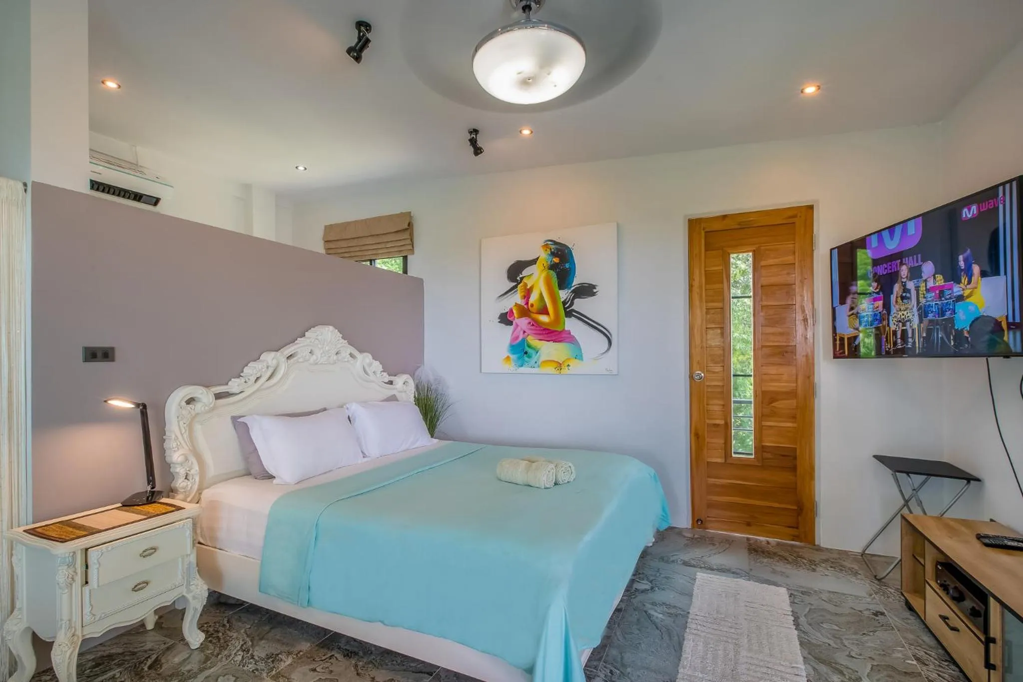 Bed in Penthouse Crystal Bay Apartments