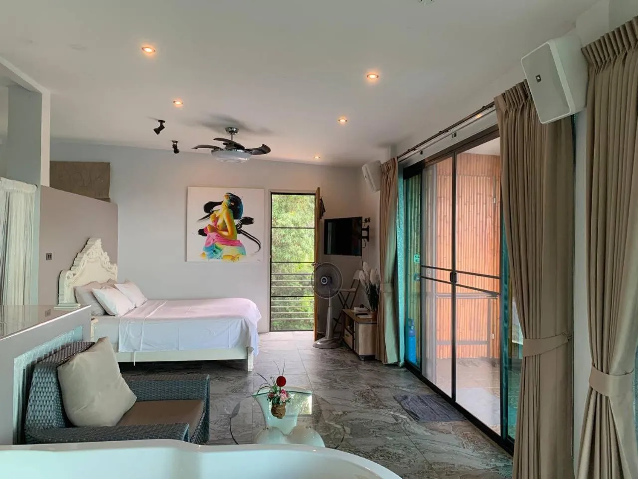 Living room, Bed in Penthouse Crystal Bay Apartments