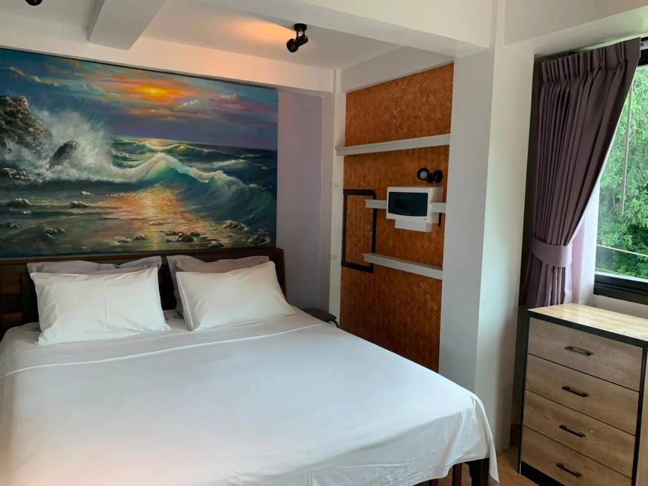 Bed in Penthouse Crystal Bay Apartments