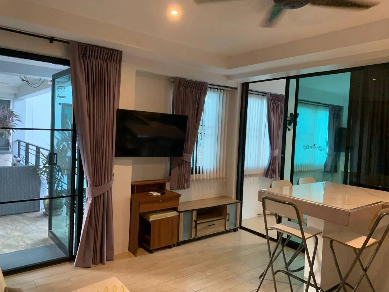 Living room, Bed in Penthouse Crystal Bay Apartments