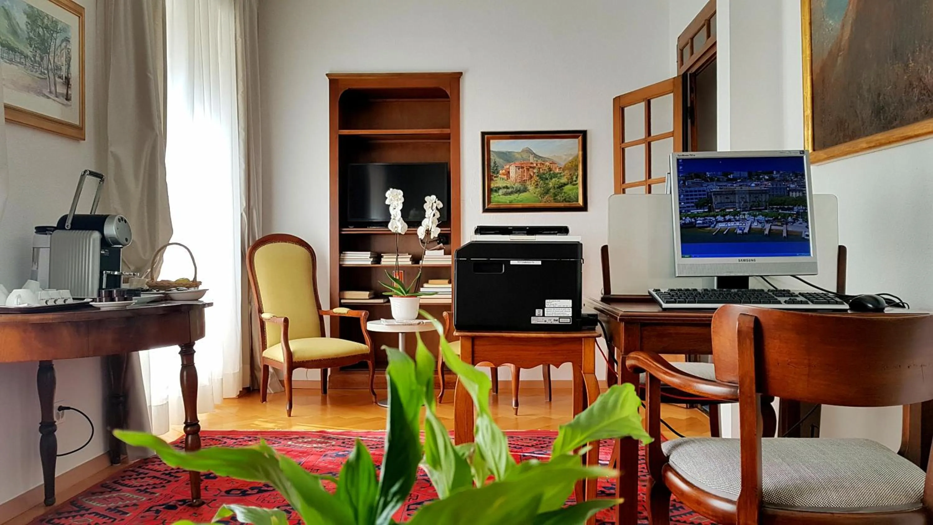 Communal lounge/ TV room in Hotel Walter Au Lac