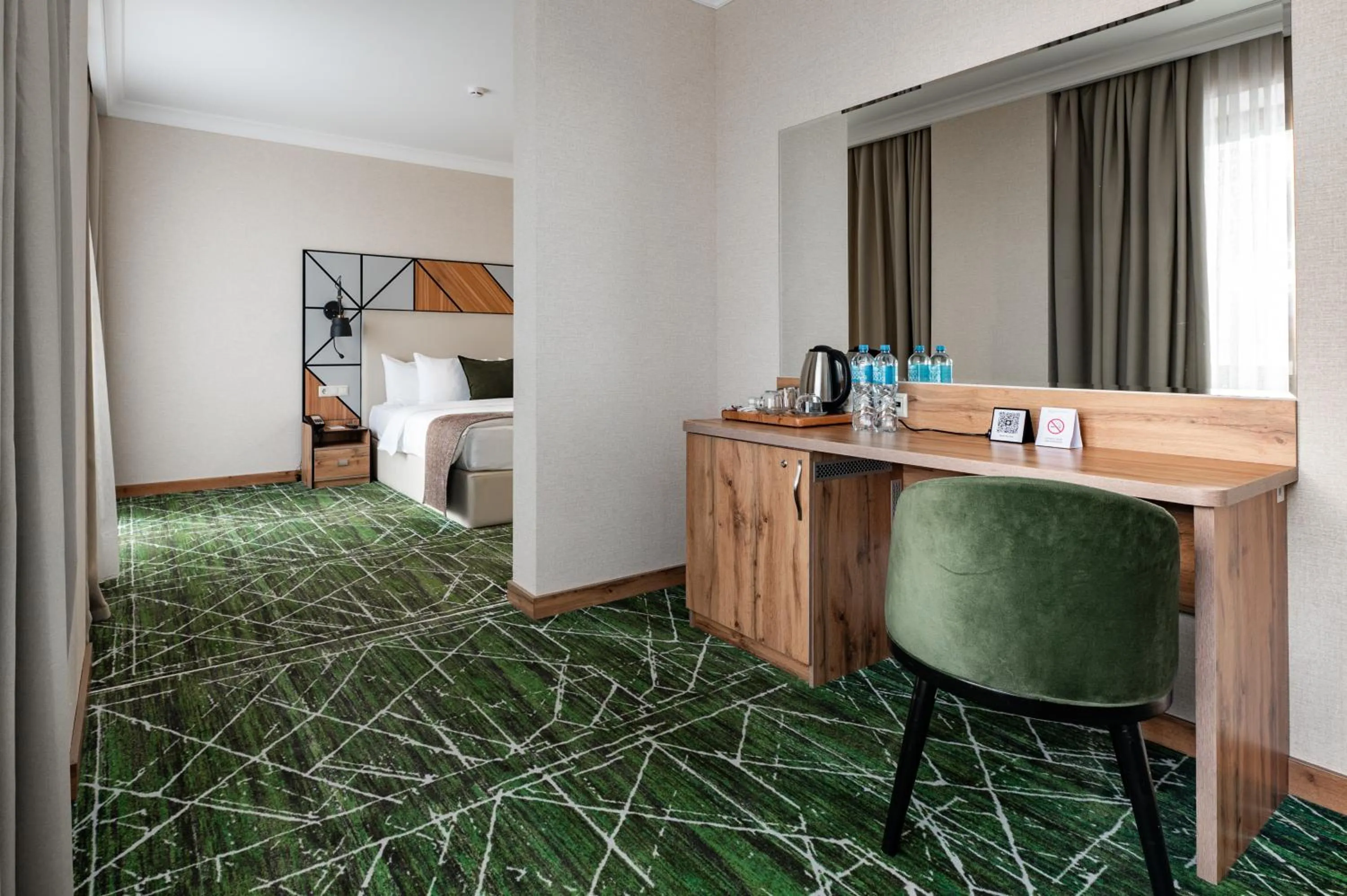 Bedroom in Wyndham Garden Burabay