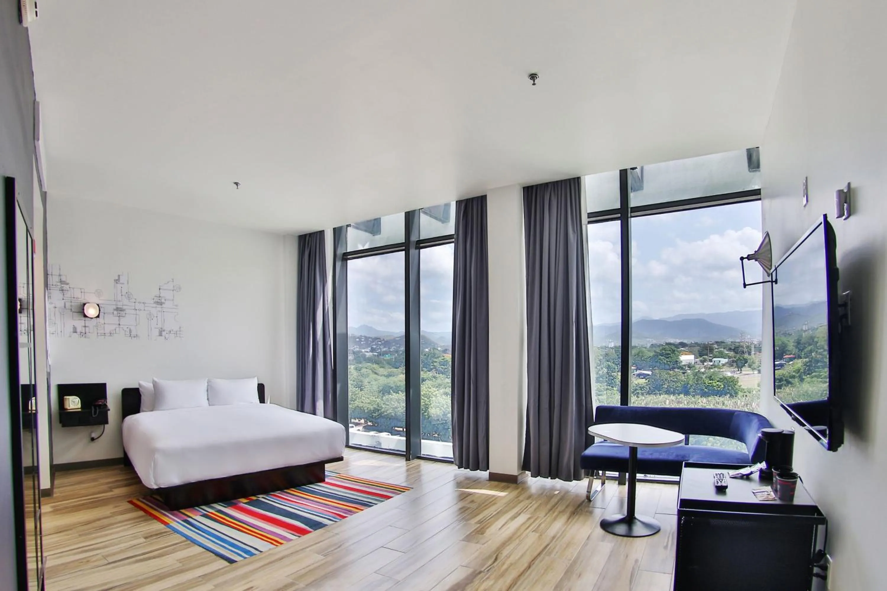 Photo of the whole room, Bed in Aloft Ponce Hotel & Casino