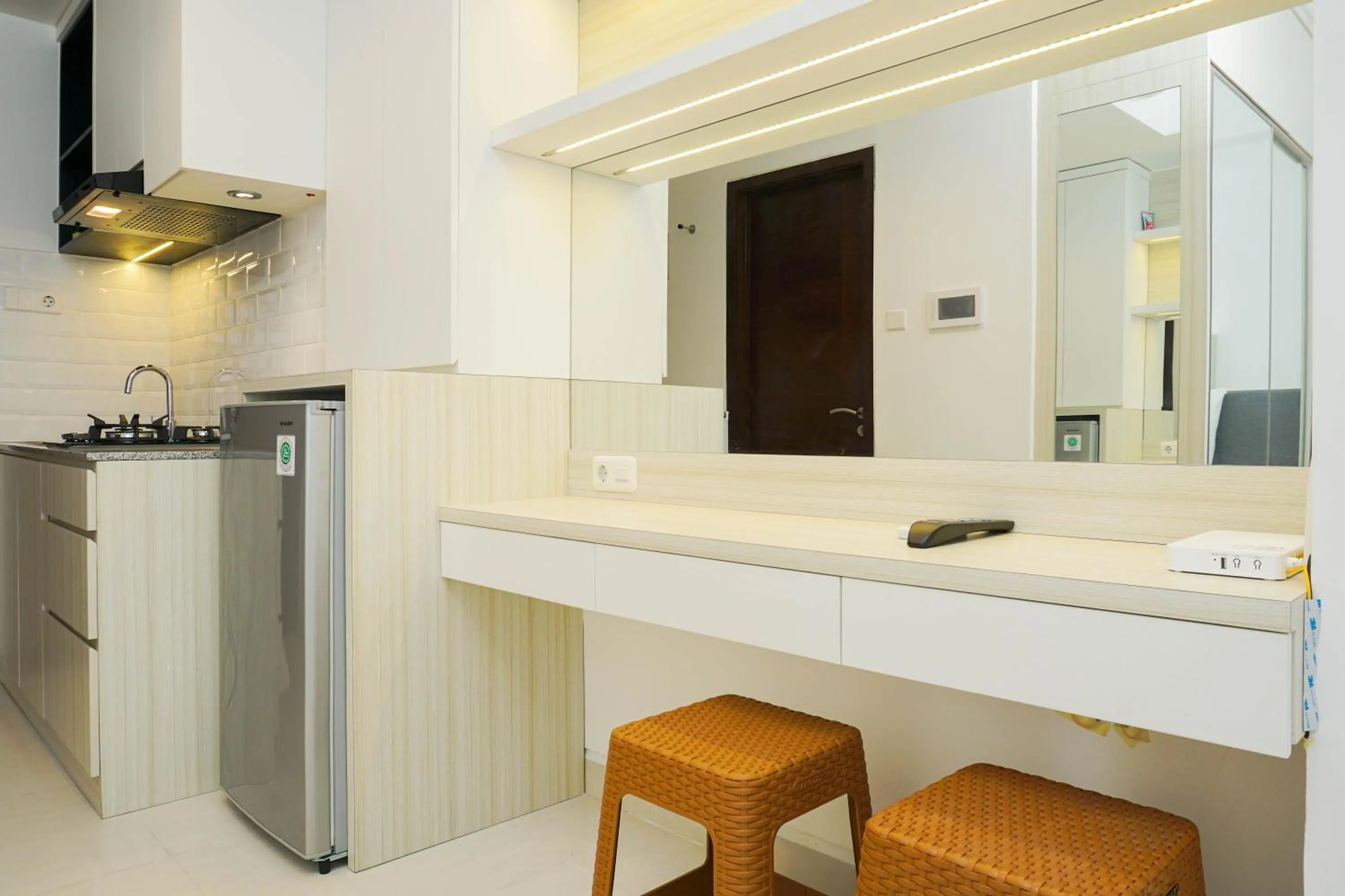 Kitchen or kitchenette in Relax and Comfy with Pool View at Studio West Vista Apartment By Travelio