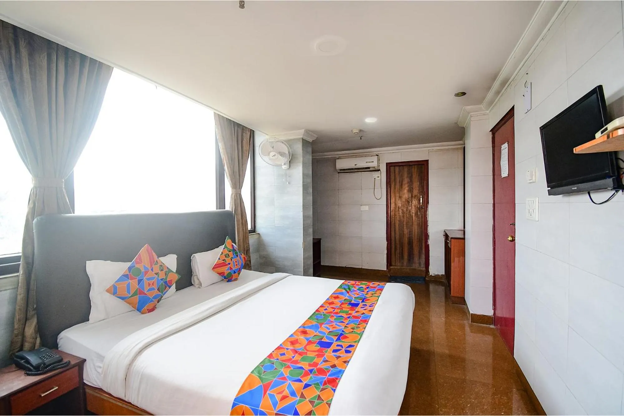 Communal lounge/ TV room, Bed in FabHotel Raj Darbar