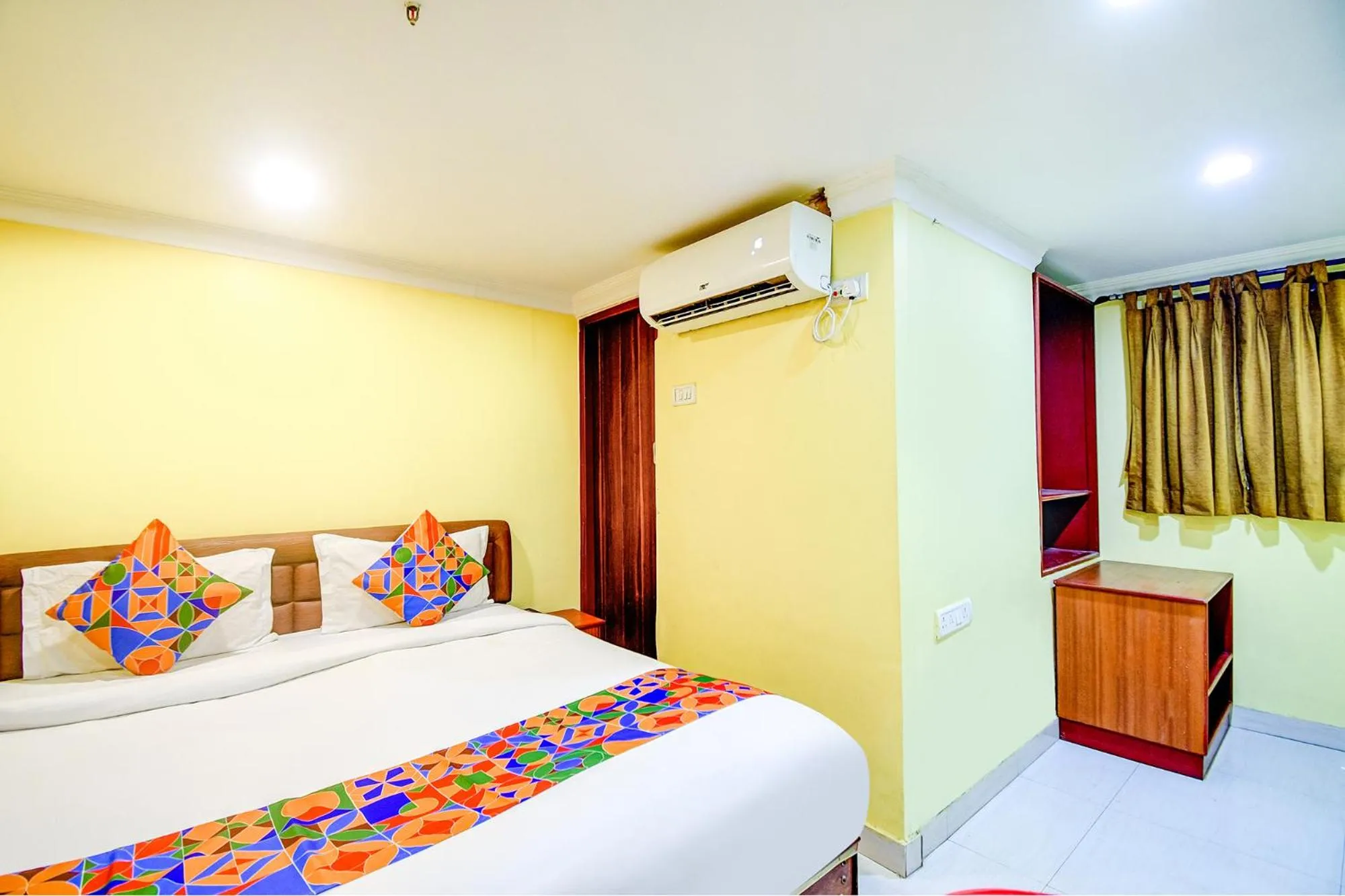Photo of the whole room, Bed in FabHotel Raj Darbar