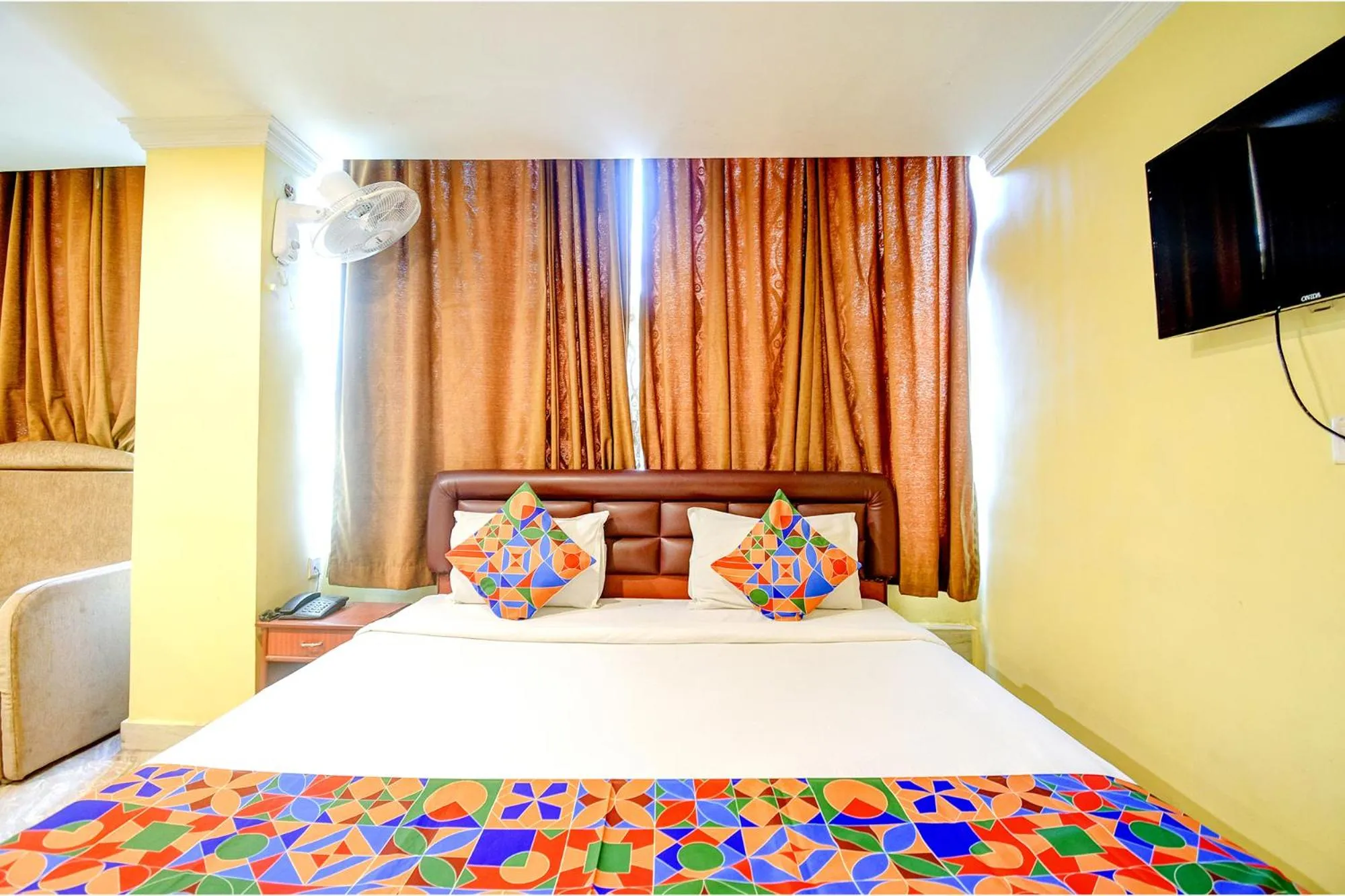Communal lounge/ TV room, Bed in FabHotel Raj Darbar
