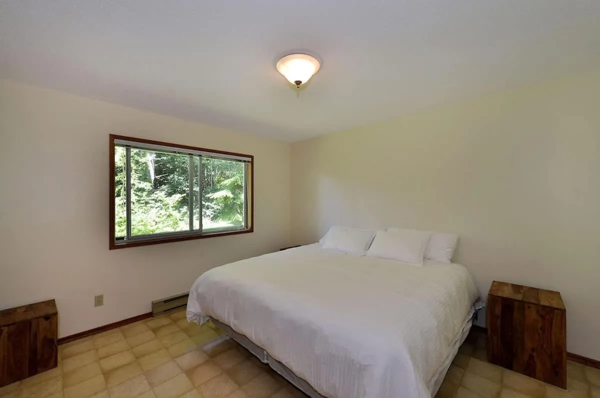 Bed in Pacific Coast Beach House by EMR Vacation Rentals