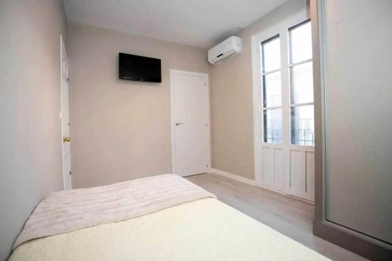 Bed in Hostal Viena Plaza Nueva