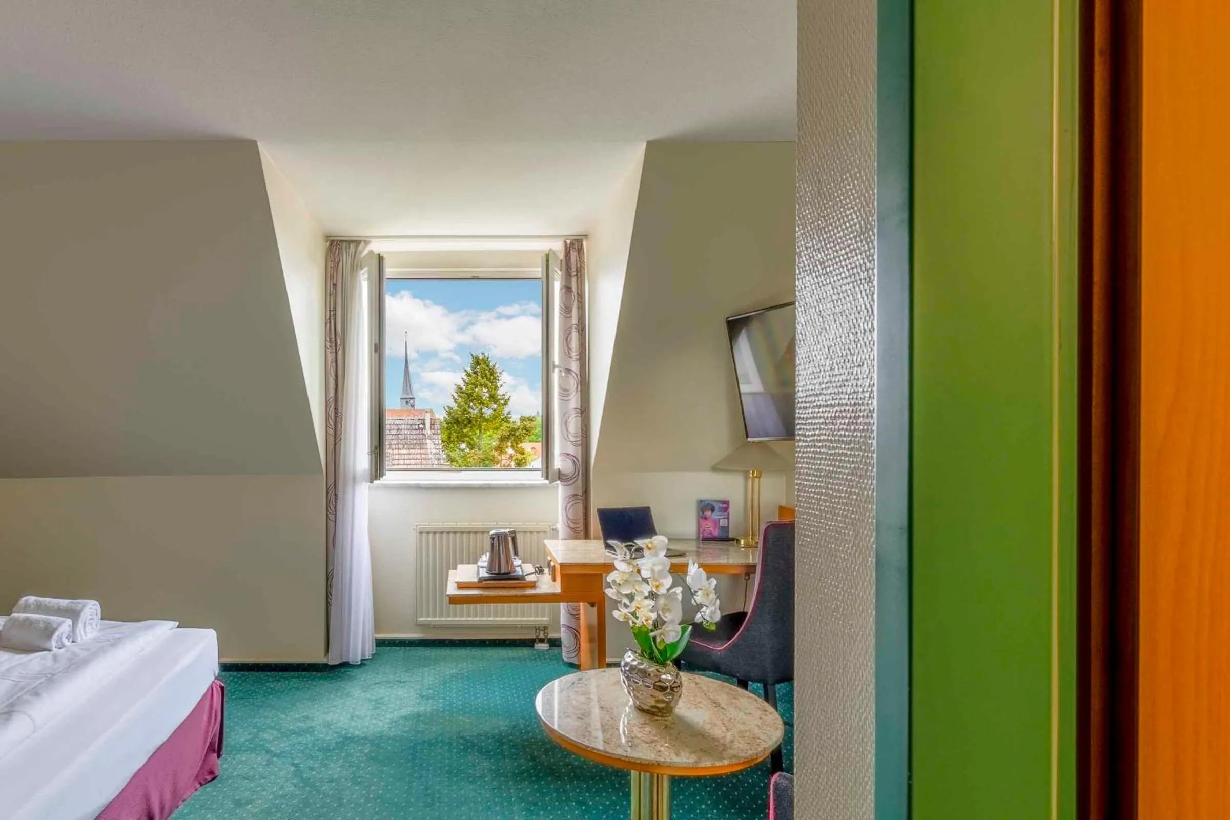 View (from property/room), Bed in PLAZA INN Blankenburg Ditzingen, Sure Hotel Collection