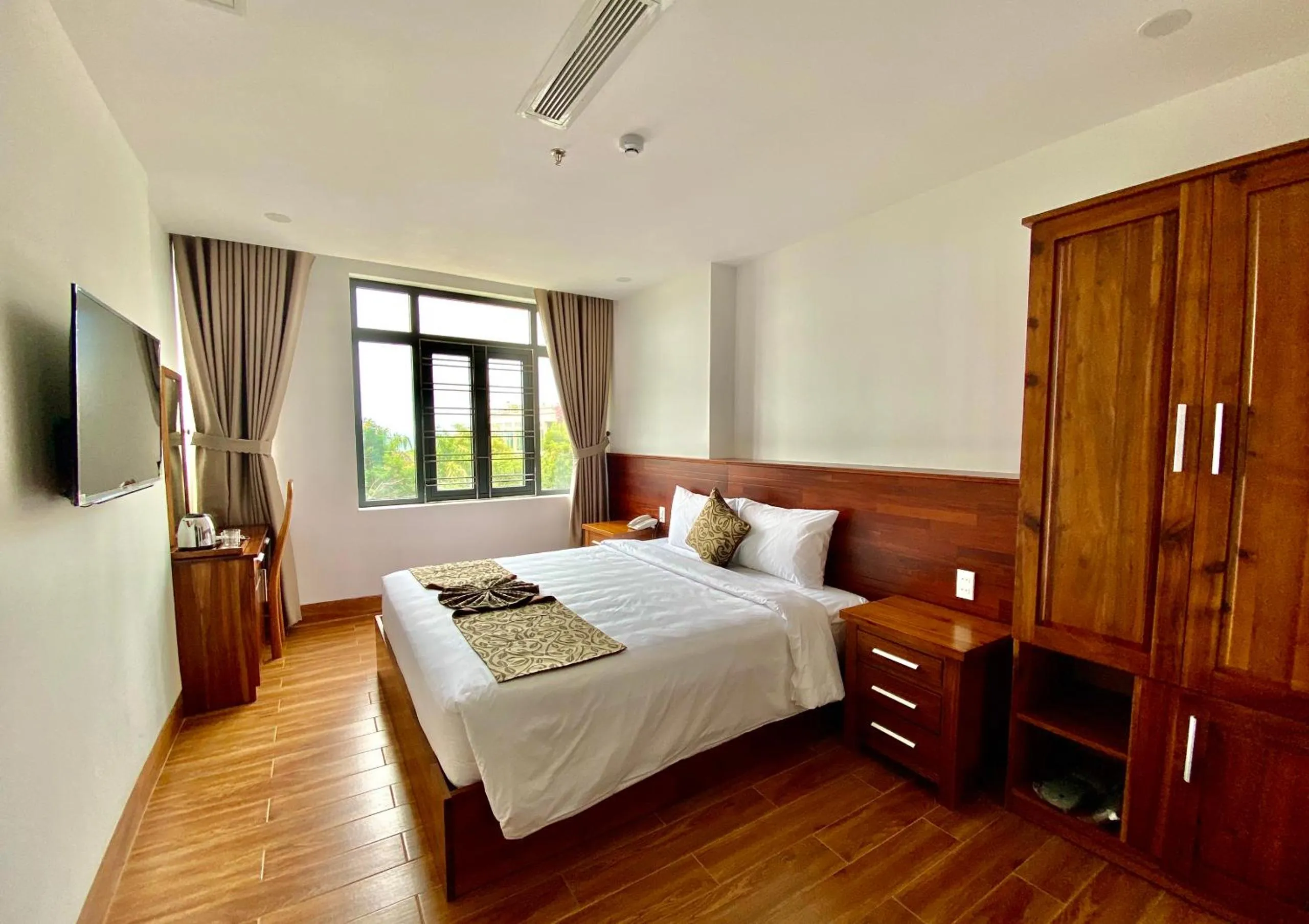 Bed in Ocean View Quy Nhon Hotel