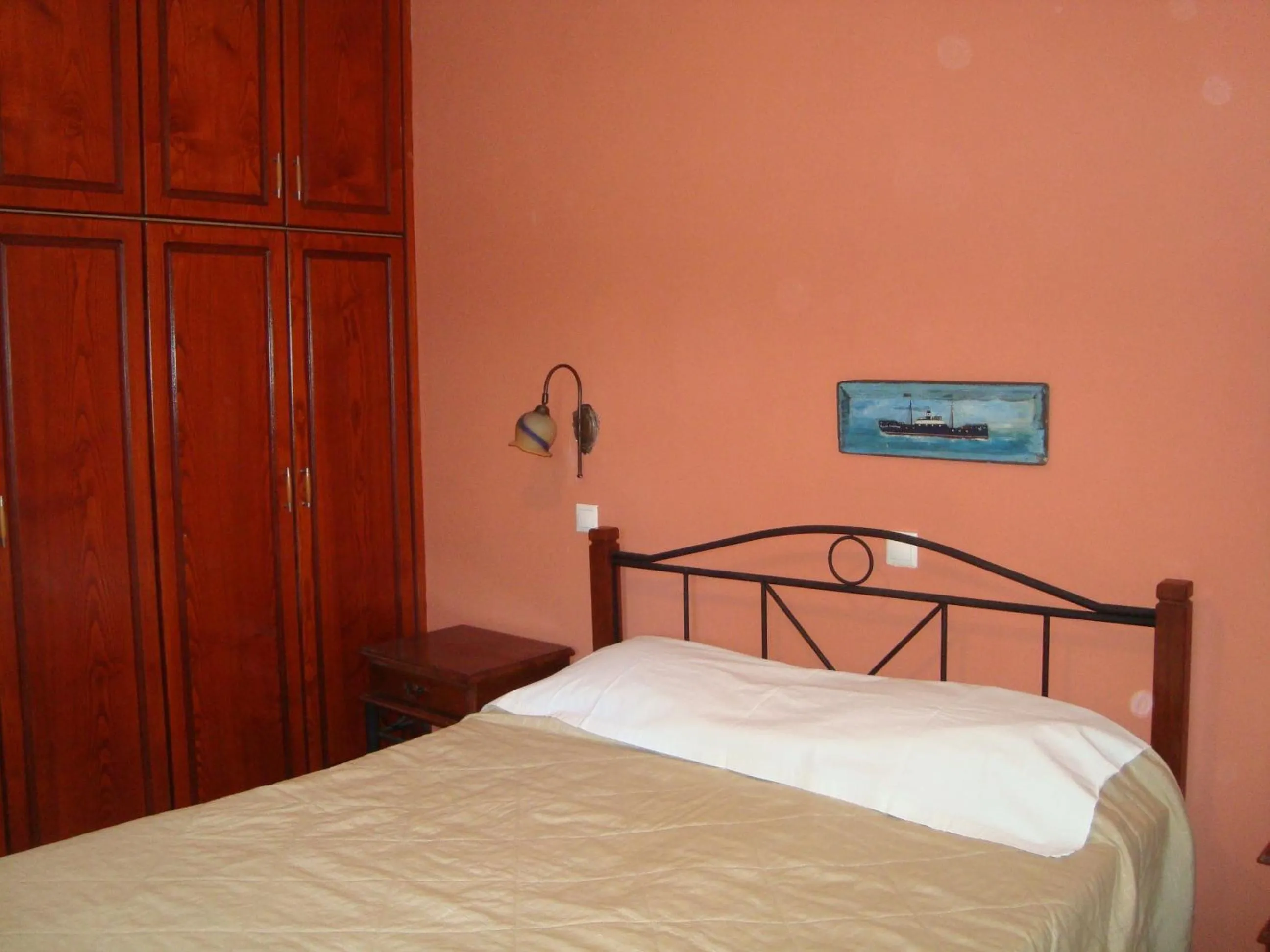 Bed in Green Hill Studios & Apartments