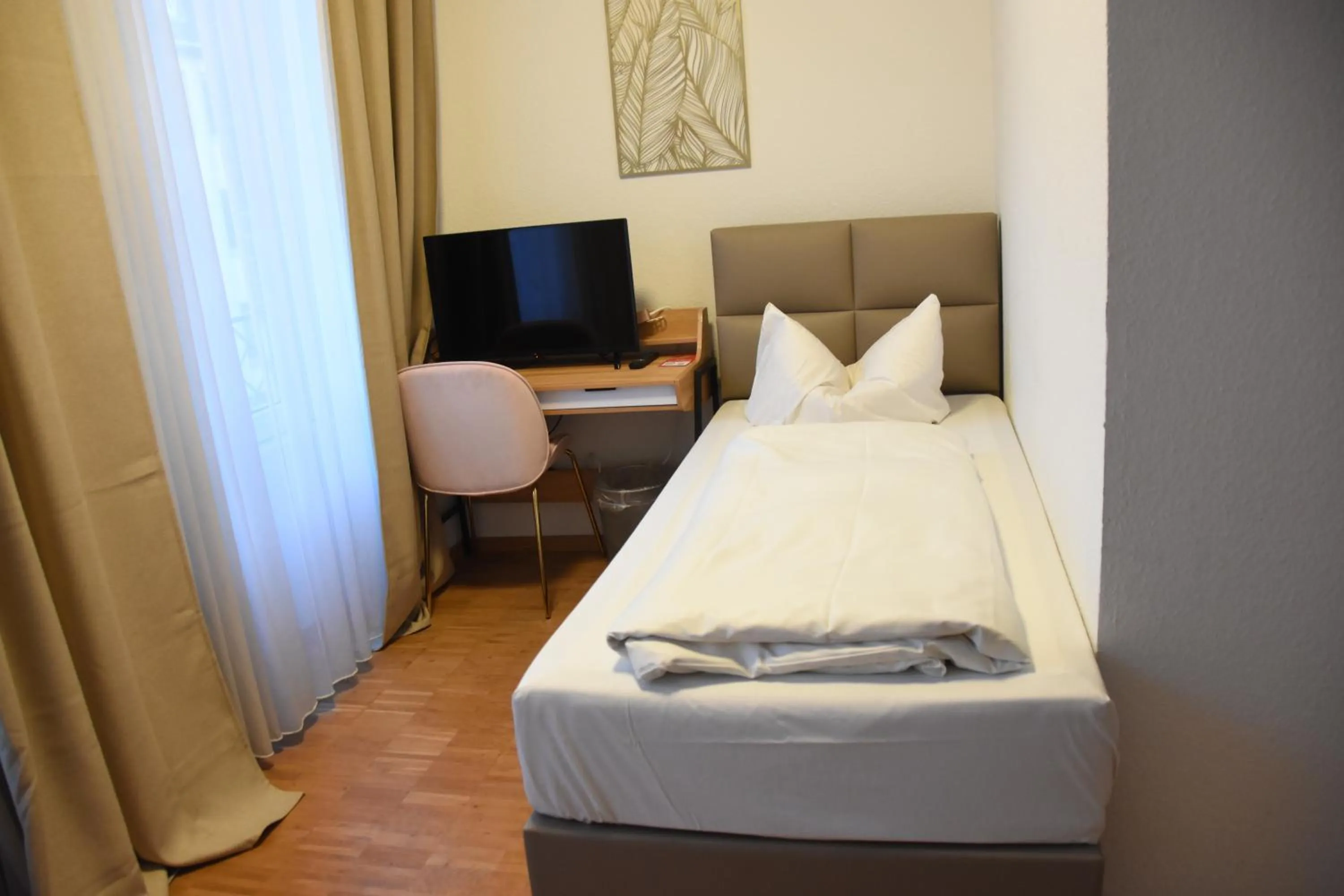 Bed in TM Hotel Düsseldorf