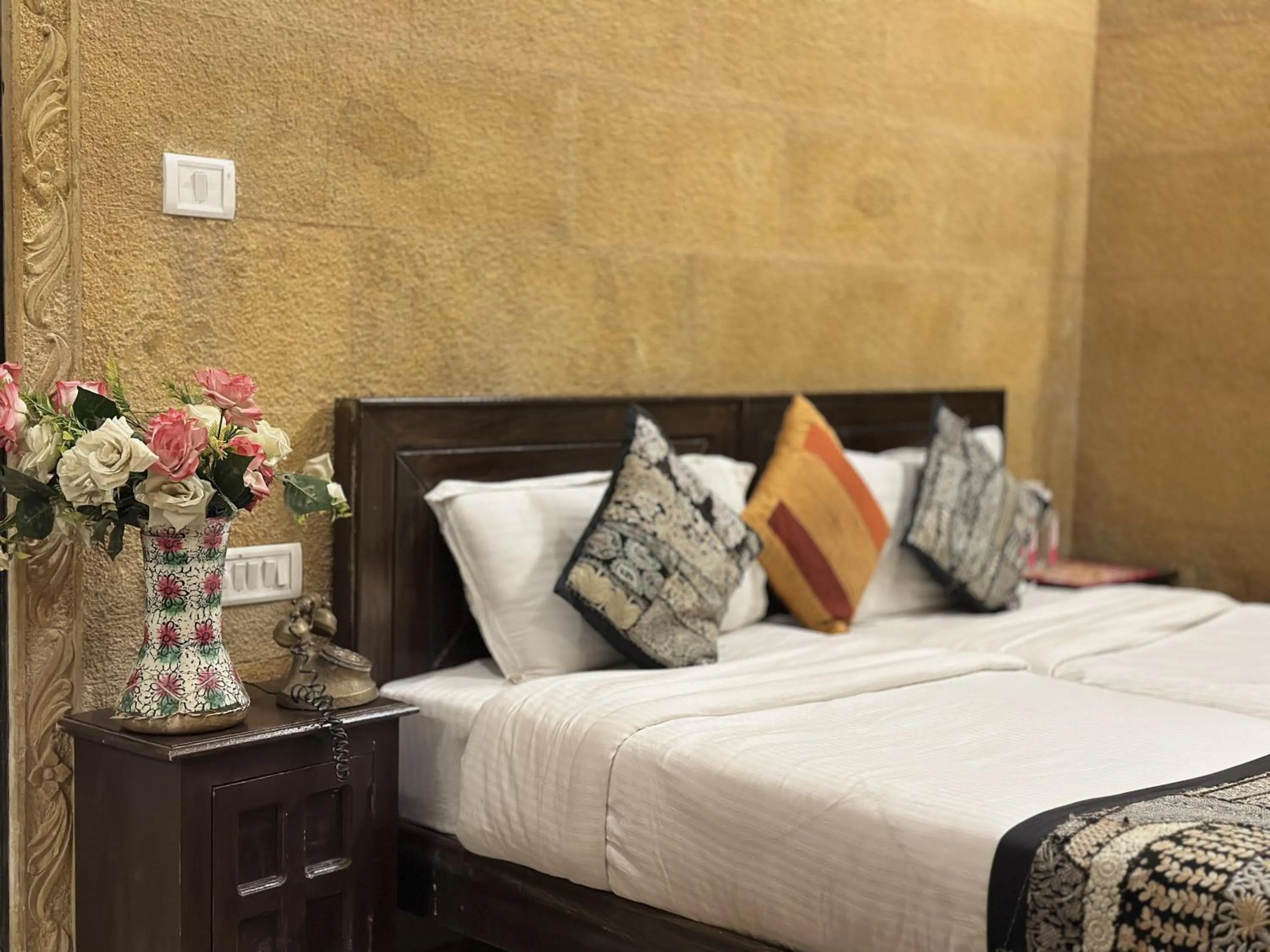 Bed in Hotel Royal Heritage