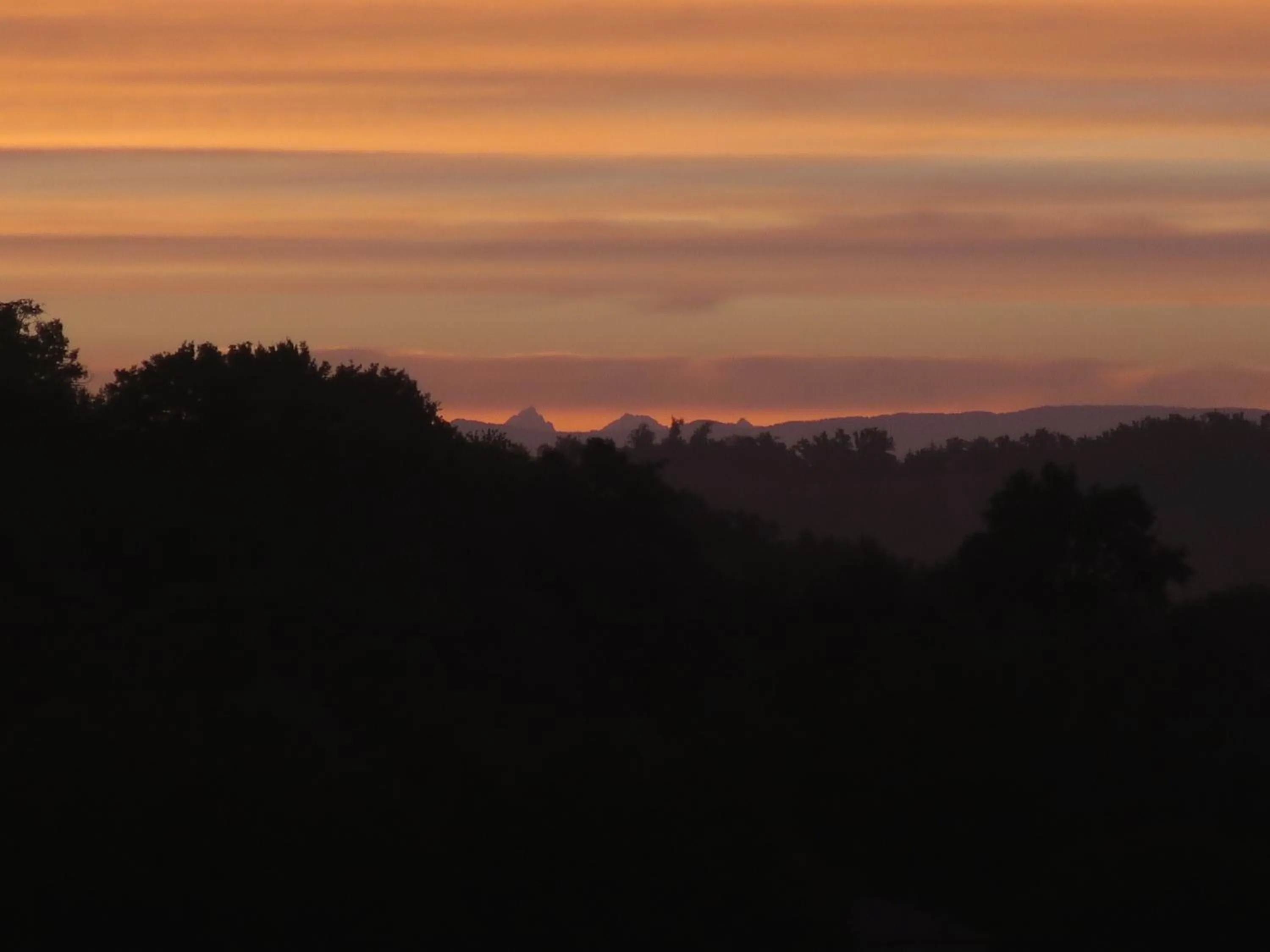 Sunset in Chambres au grand calme dans maison