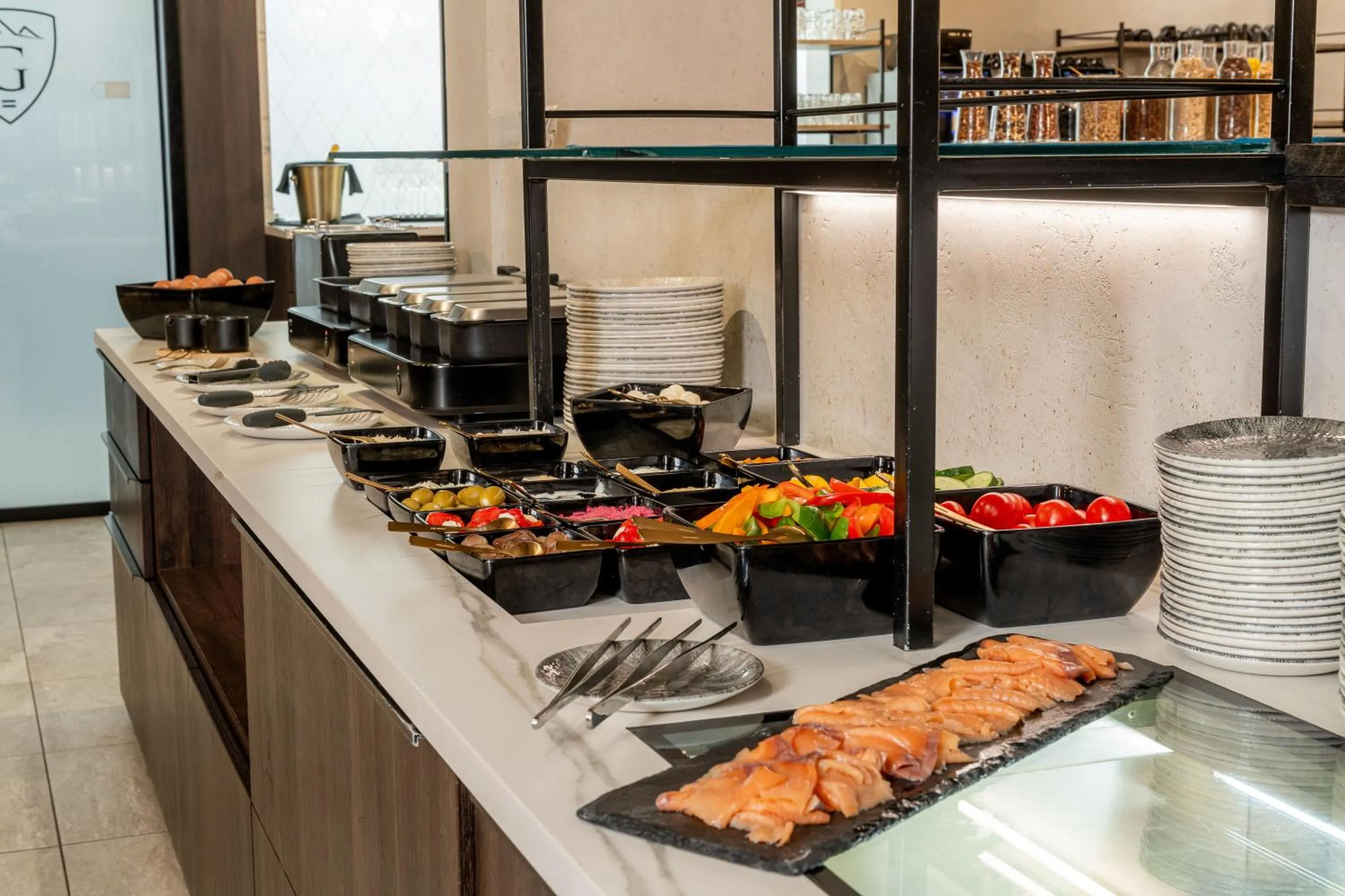 Buffet breakfast in GLEMM by AvenidA Superior Hotel & Residences
