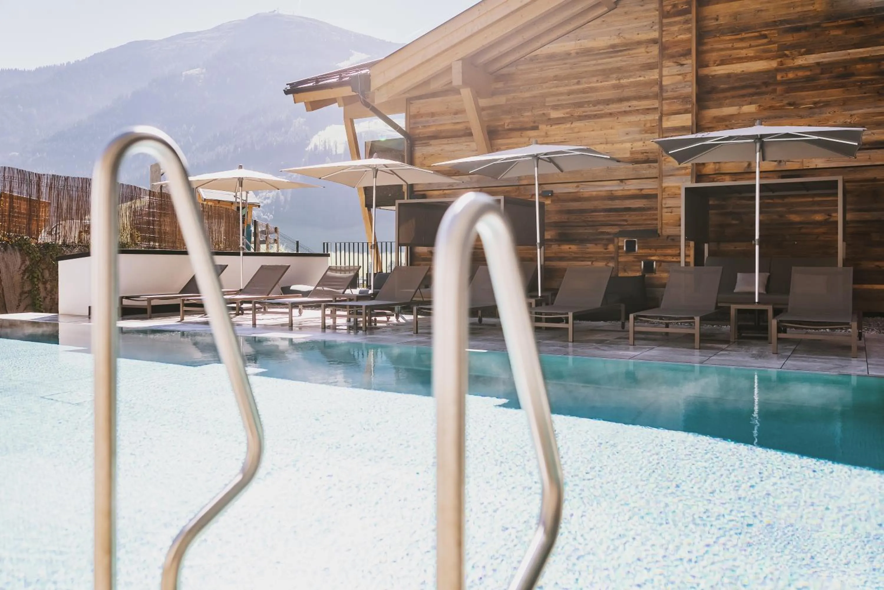 Swimming pool in GLEMM by AvenidA Superior Hotel & Residences