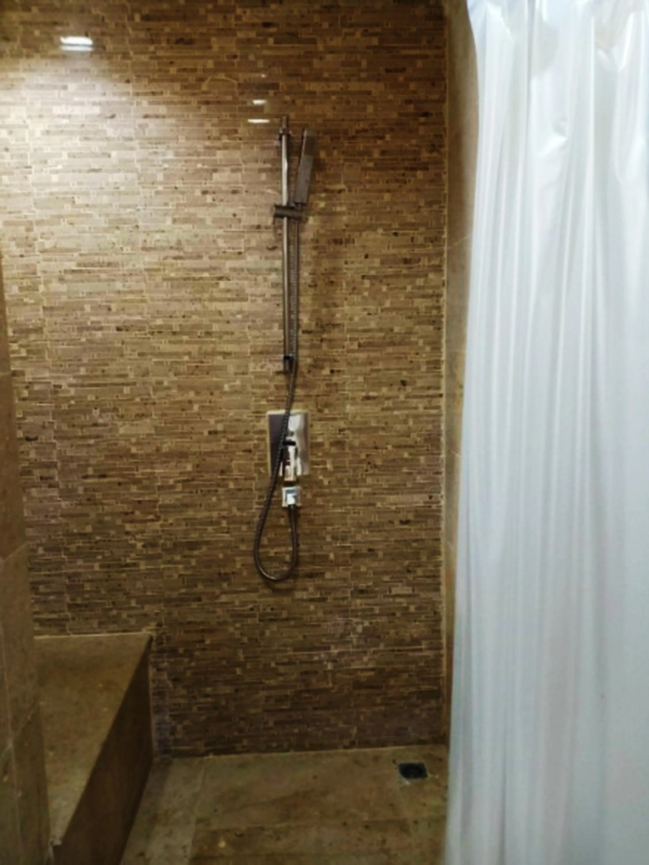 Shower in V Verve Service Apartment Hotel
