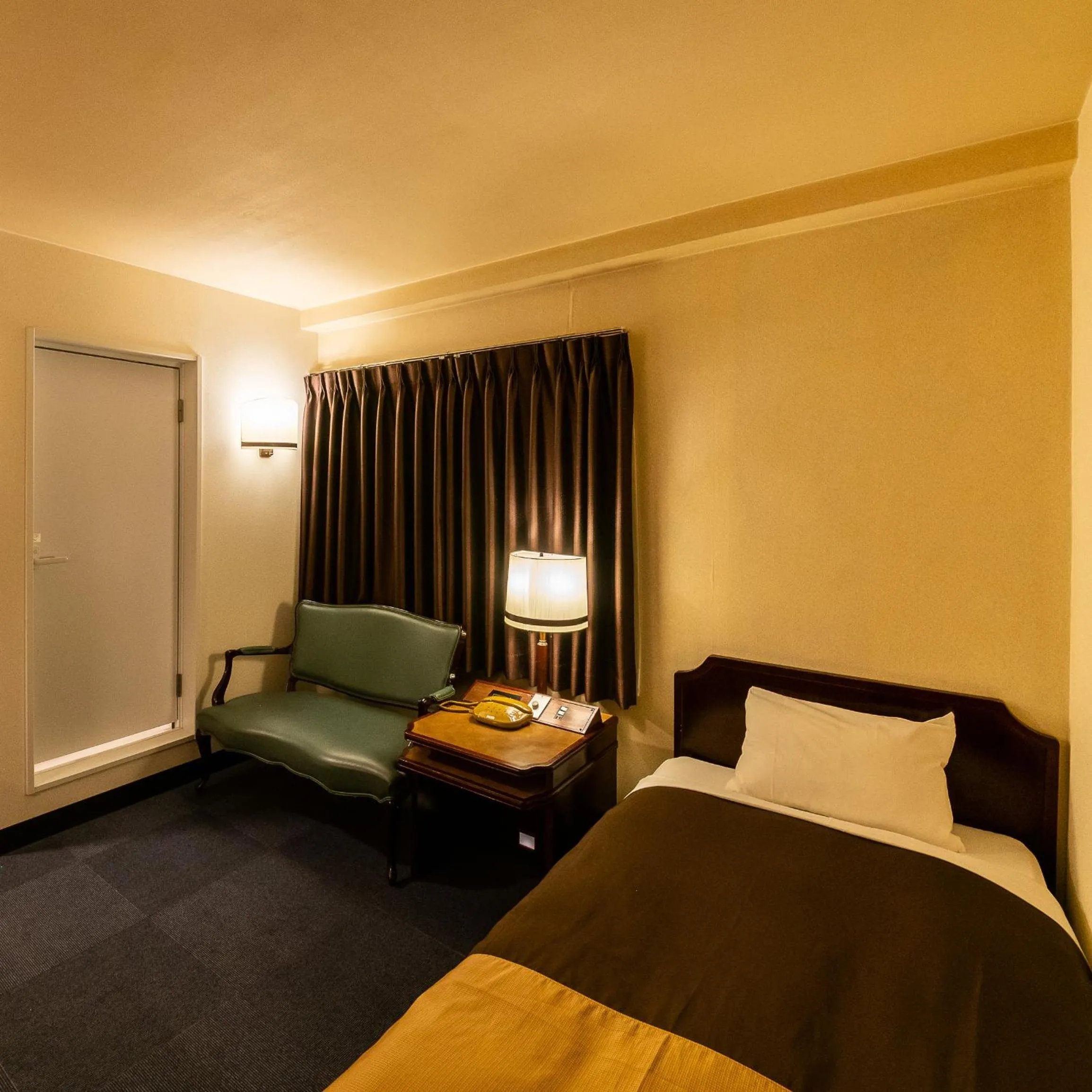 Bed in Kyoto Central Inn