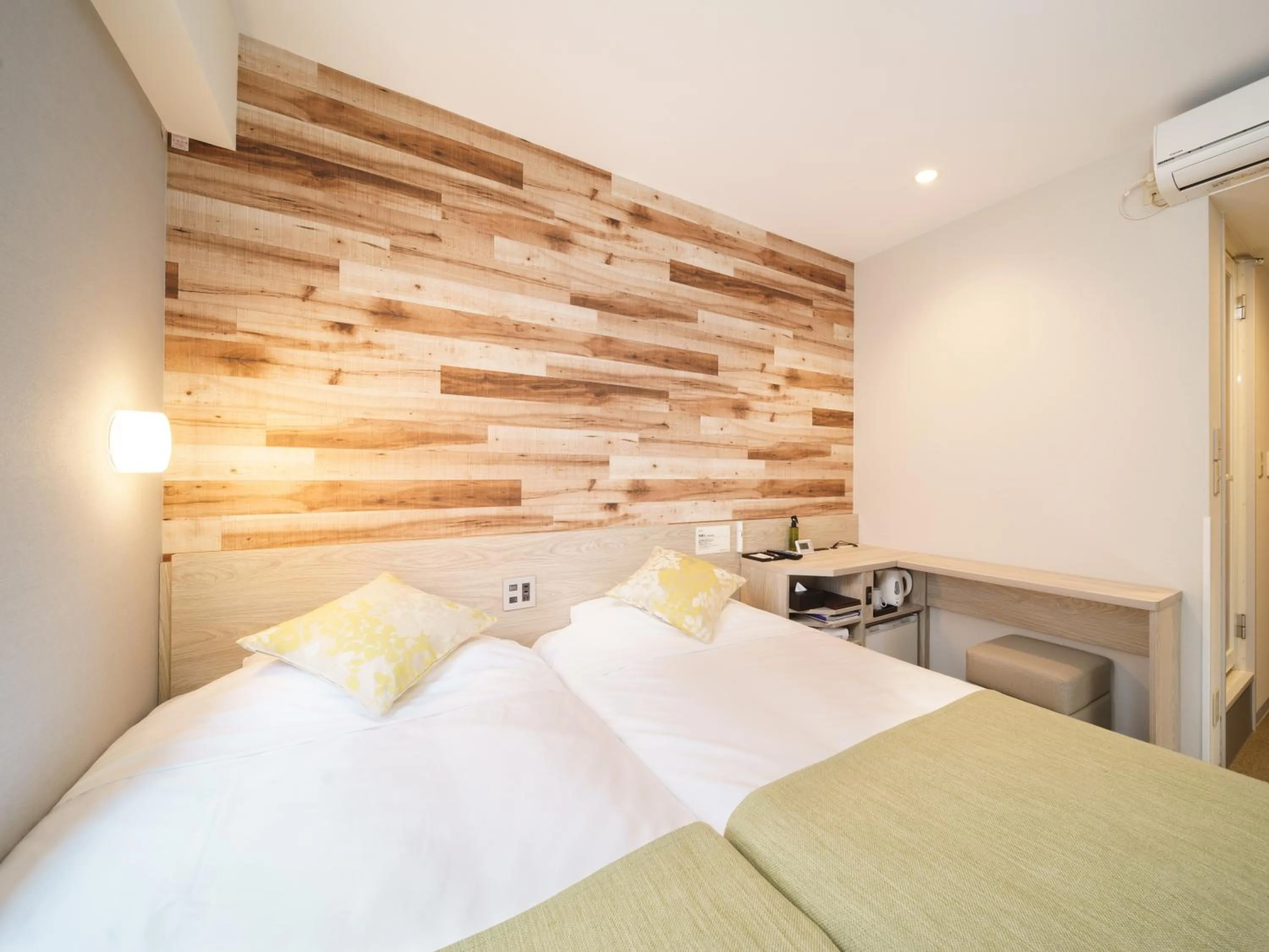 Bed in Super Hotel Sendai Hirose Dori