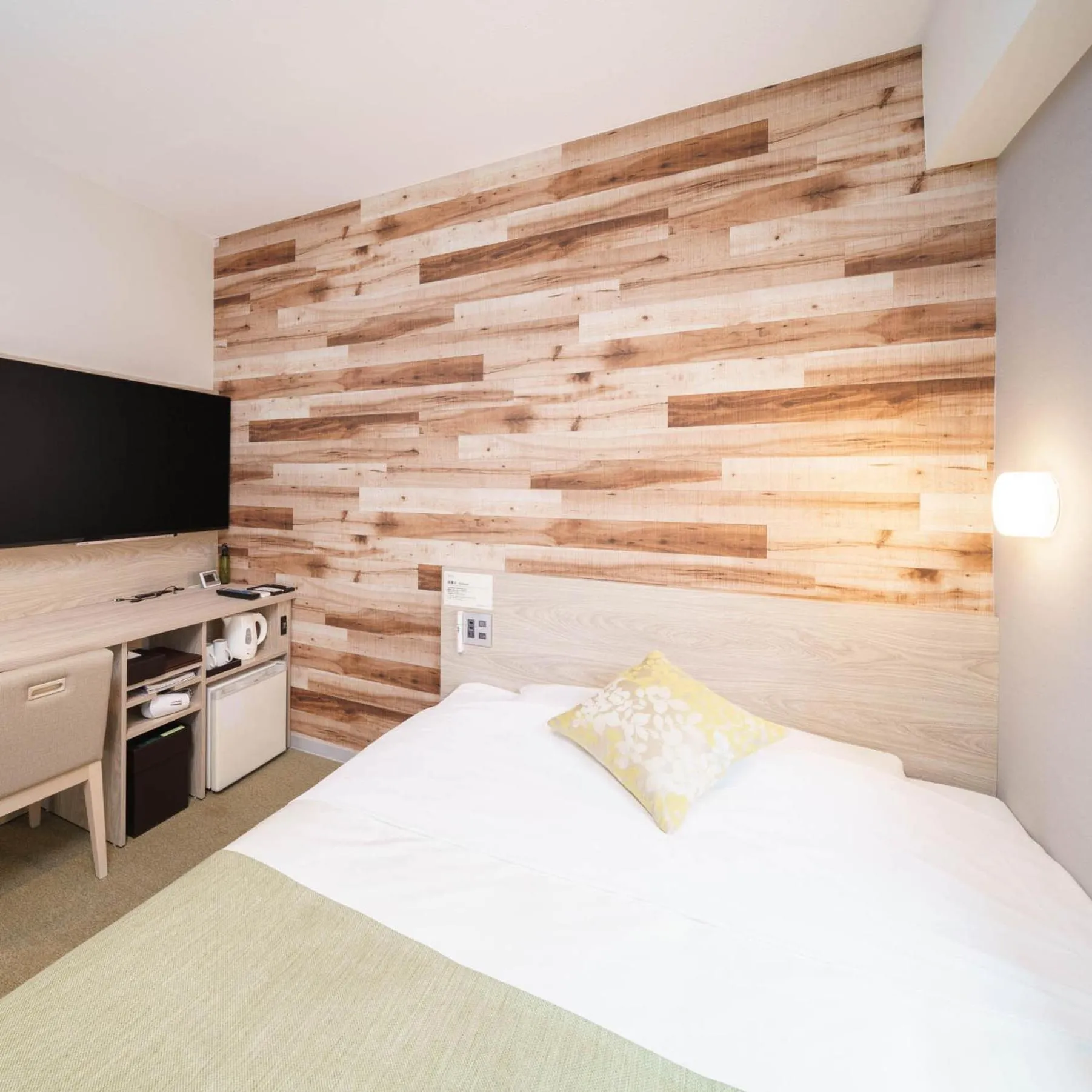 Bed in Super Hotel Sendai Hirose Dori