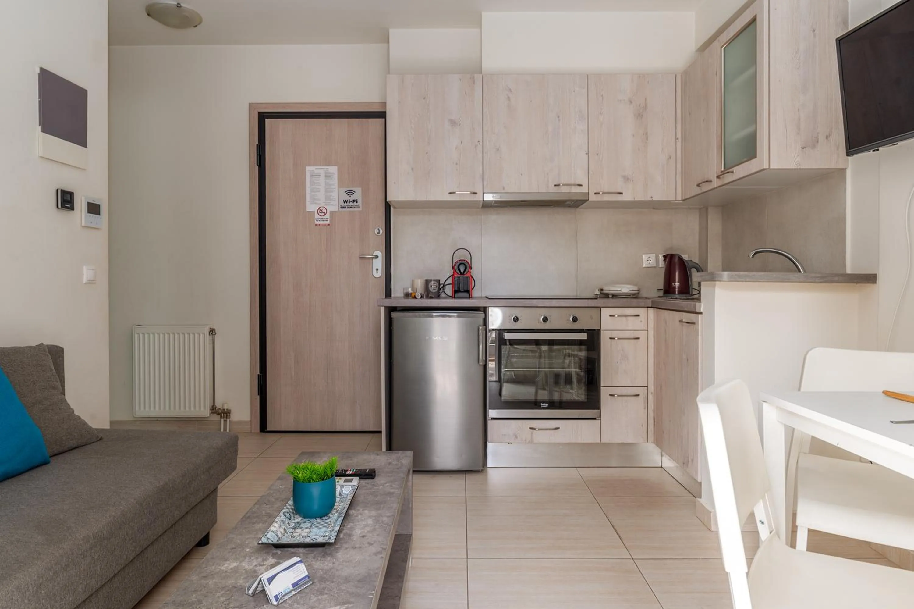 Kitchen or kitchenette in Elvita Apartments 3