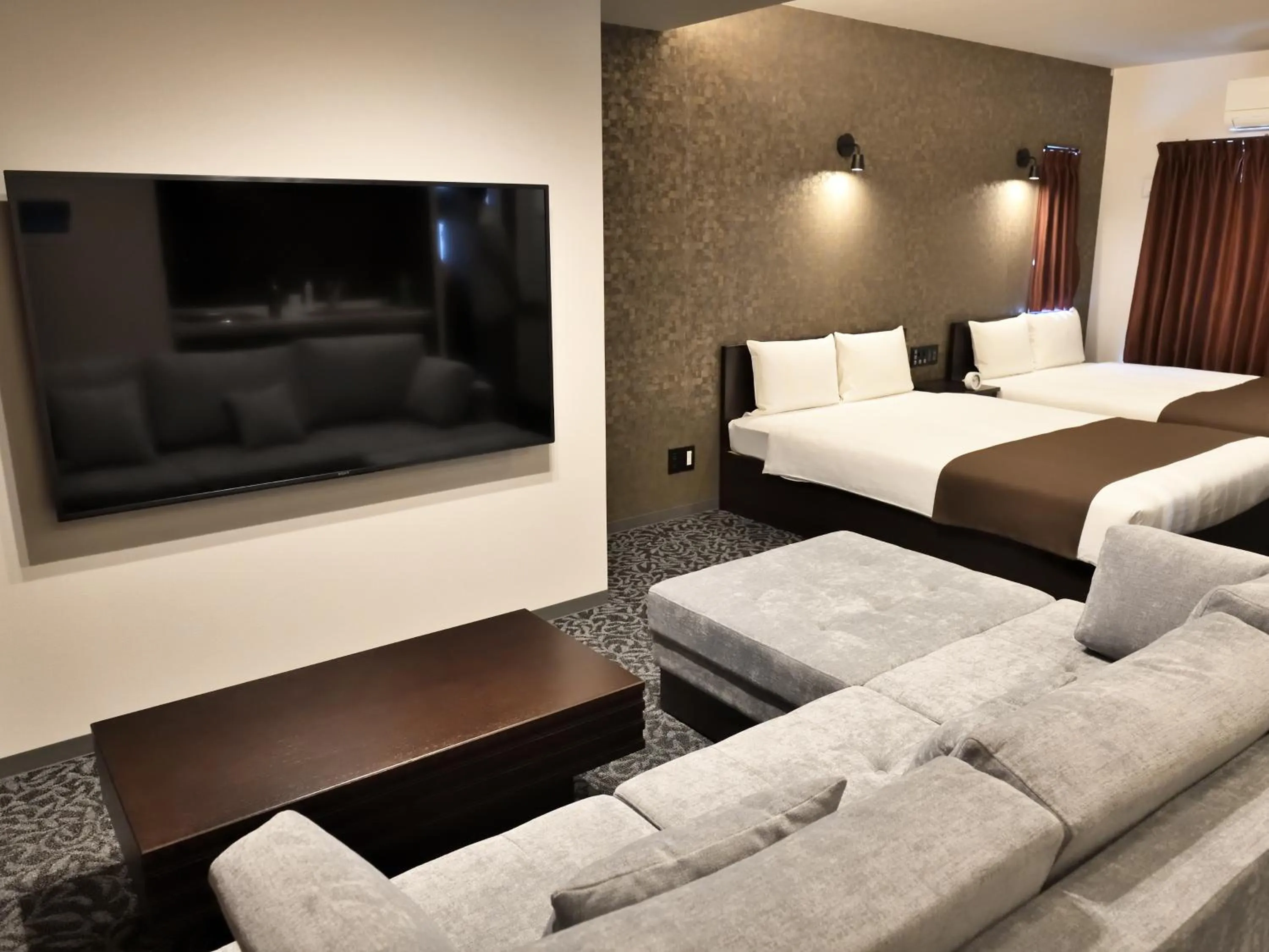 Living room, Bed in Amistad Hotel Fukuoka