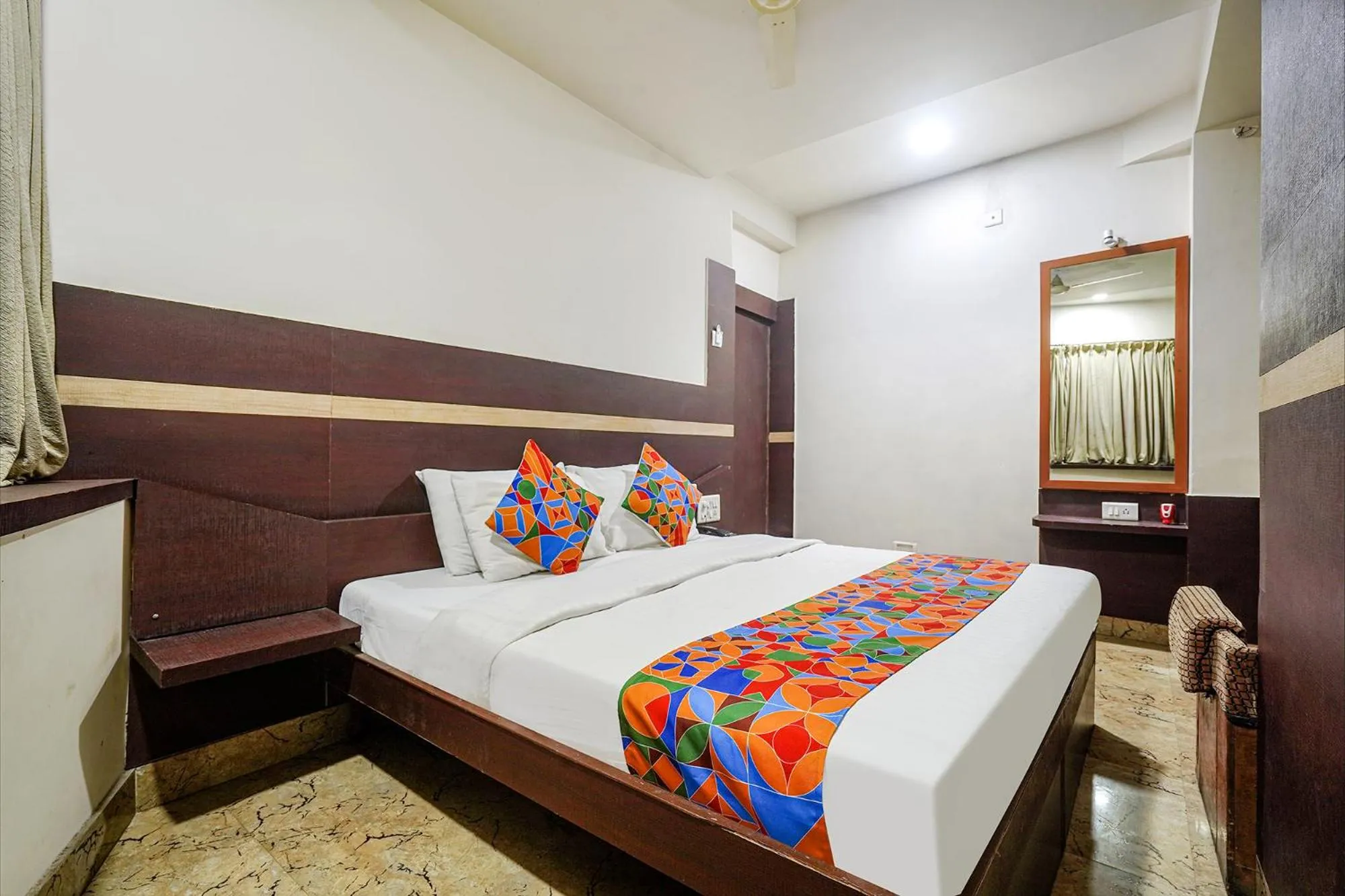 Bed in FabHotel Shravan - Nr Eternity Mall