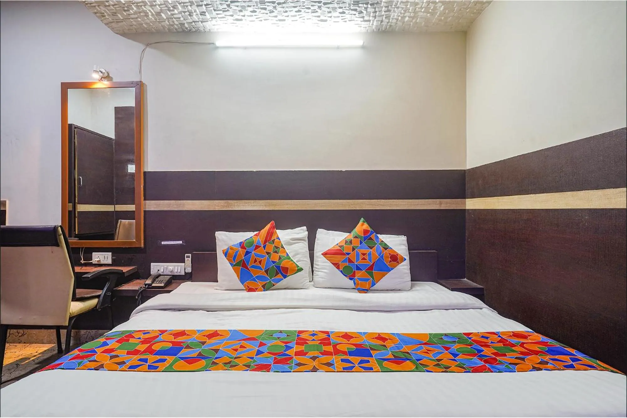 Bed in FabHotel Shravan - Nr Eternity Mall