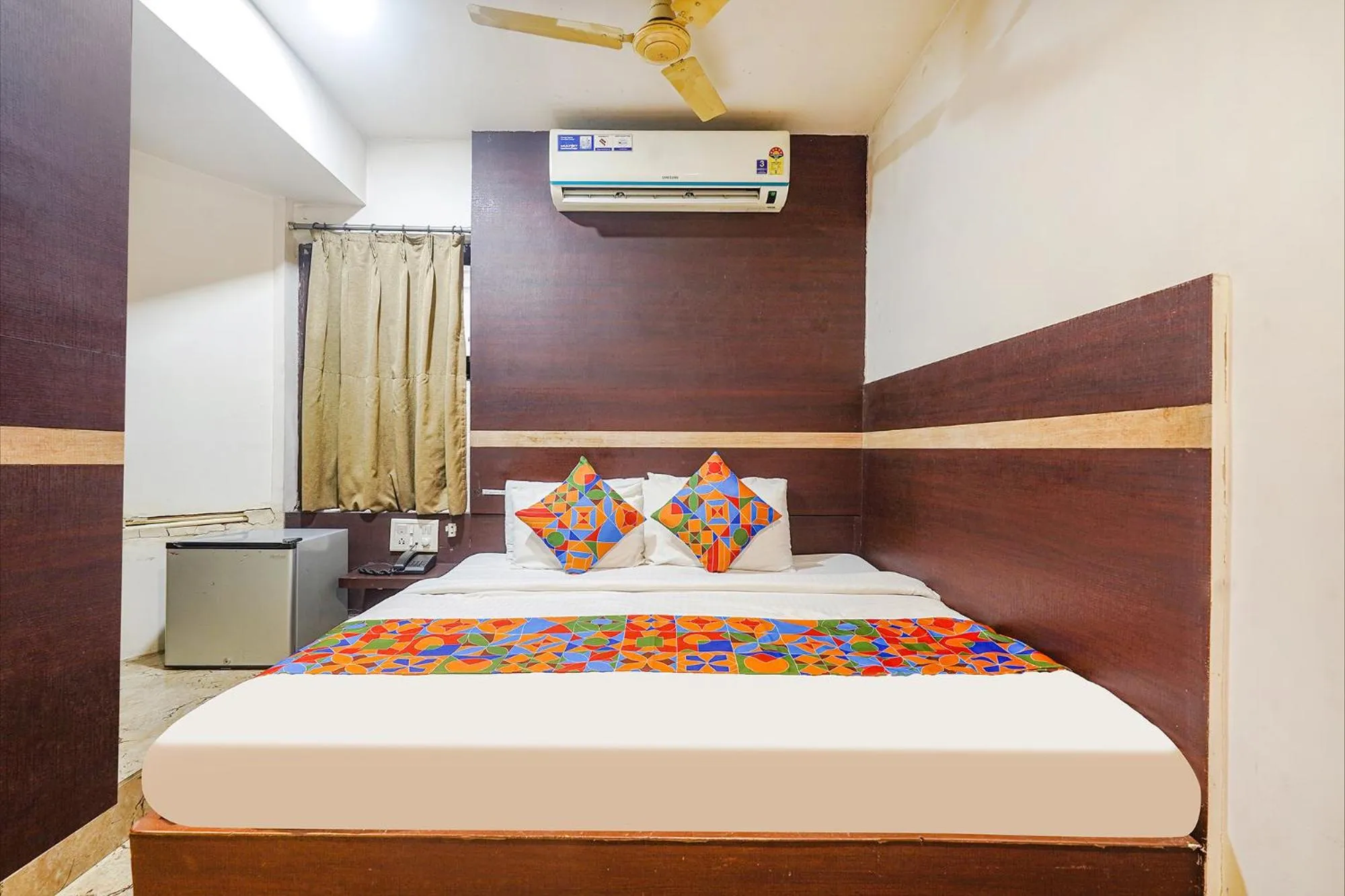 Bed in FabHotel Shravan - Nr Eternity Mall
