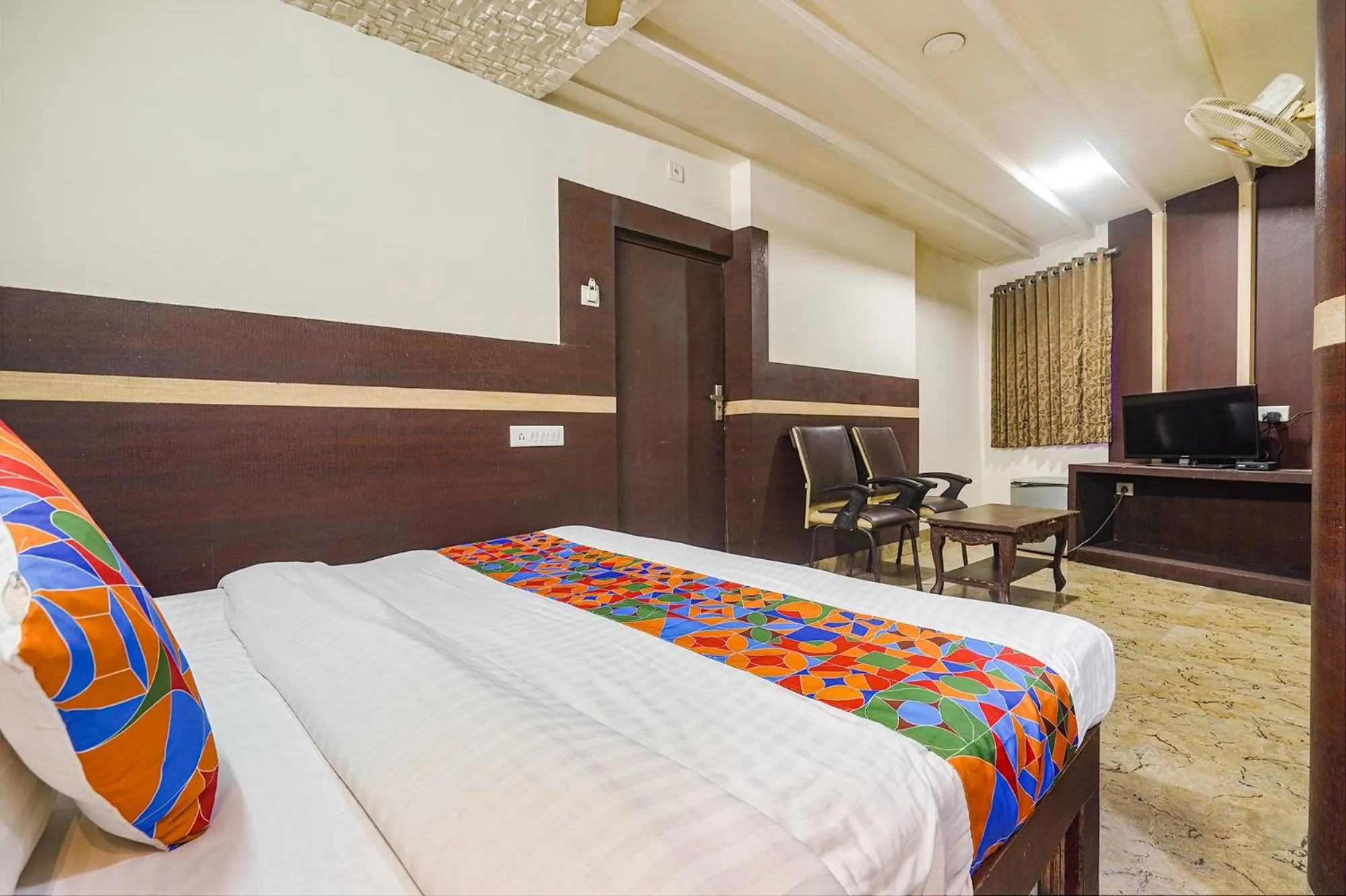 Bed in FabHotel Shravan - Nr Eternity Mall