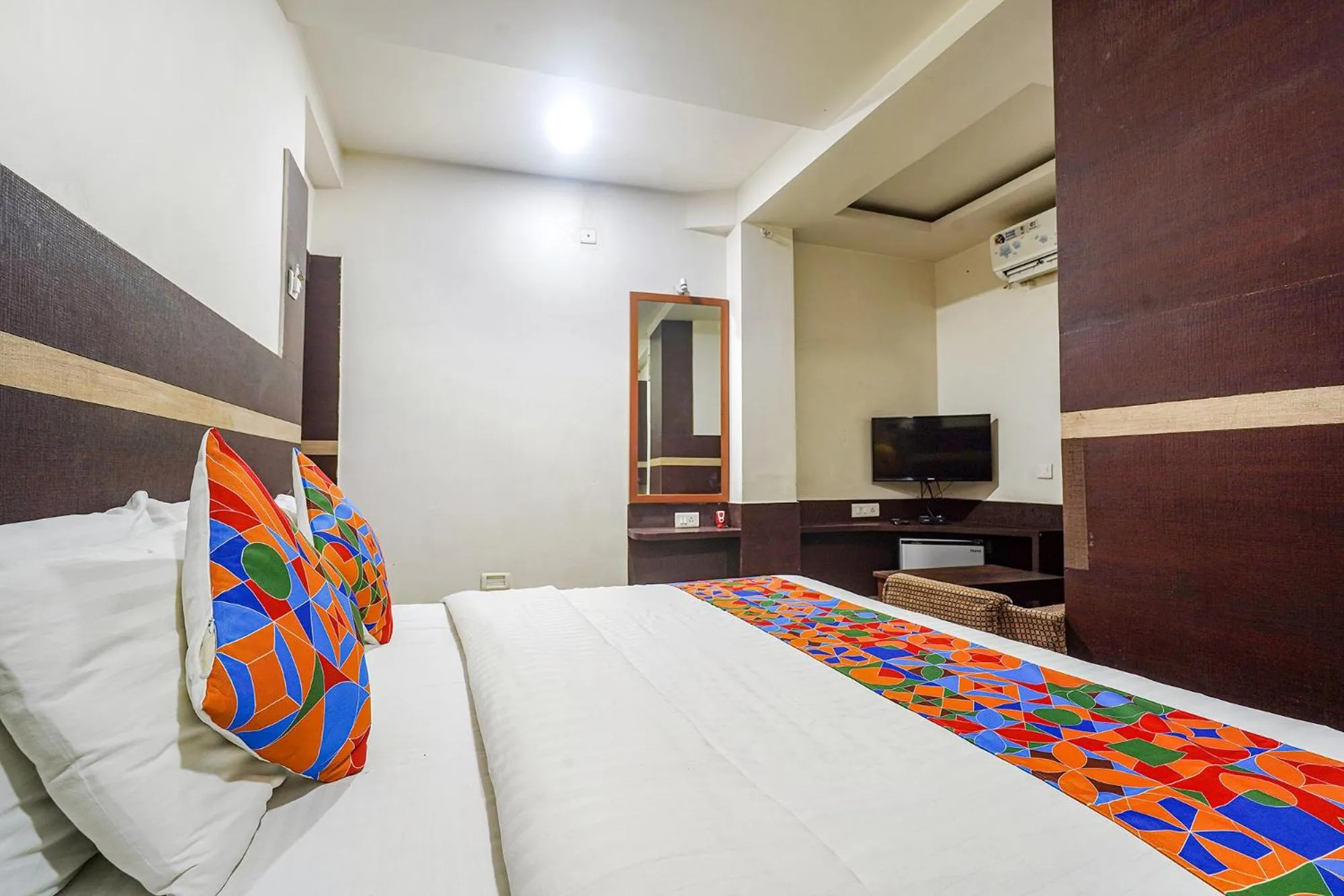 Bed in FabHotel Shravan - Nr Eternity Mall