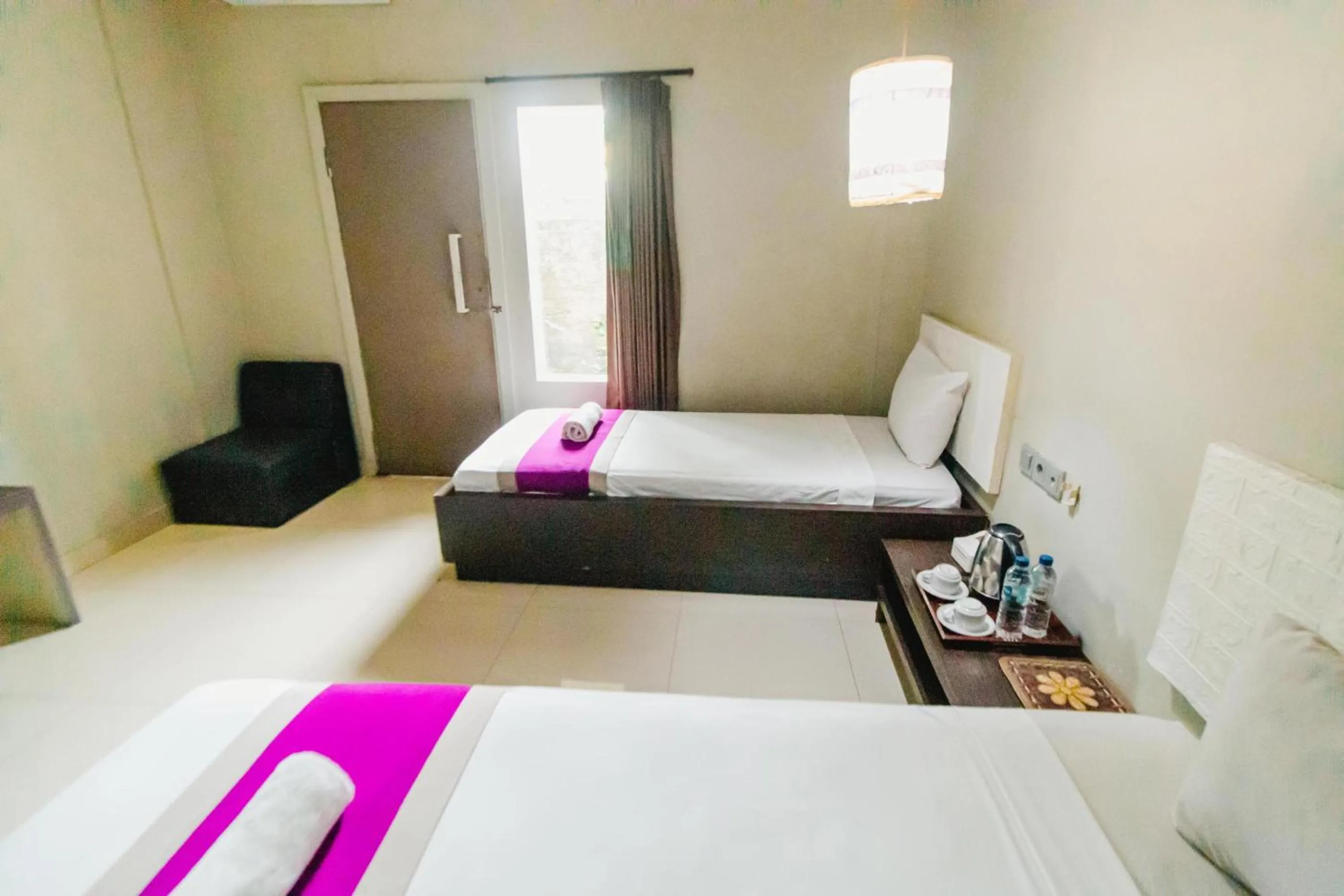 Bed in Bidari Hotel Lombok