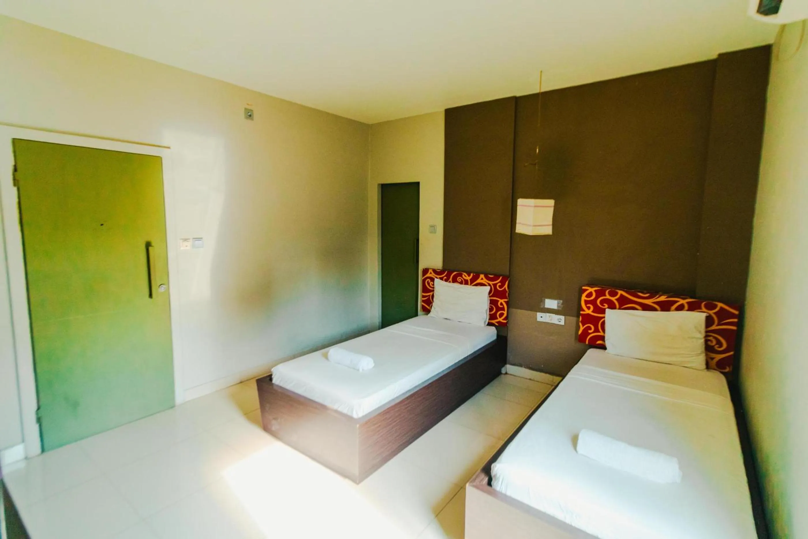 Bed in Bidari Hotel Lombok