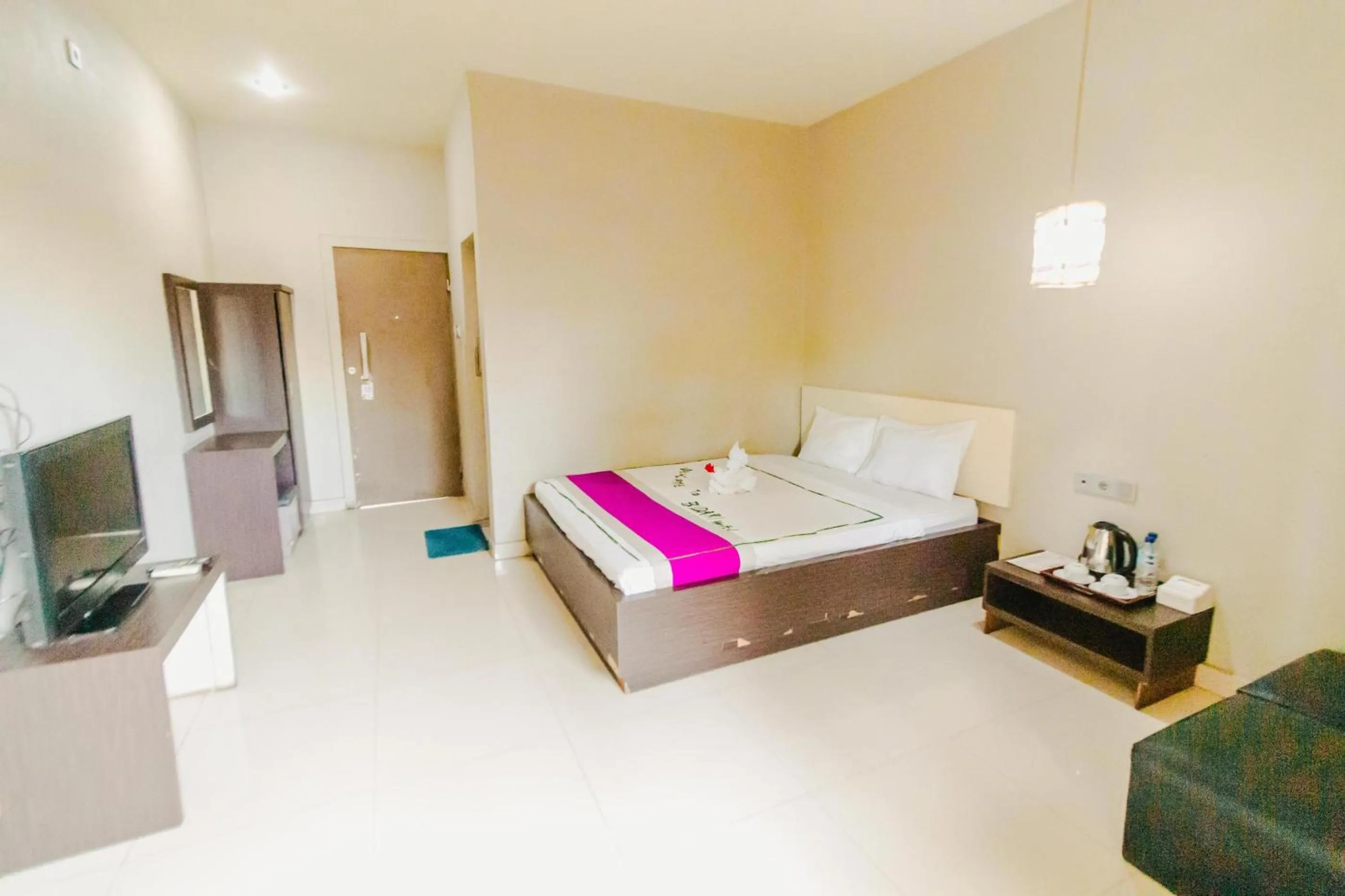 Bed in Bidari Hotel Lombok