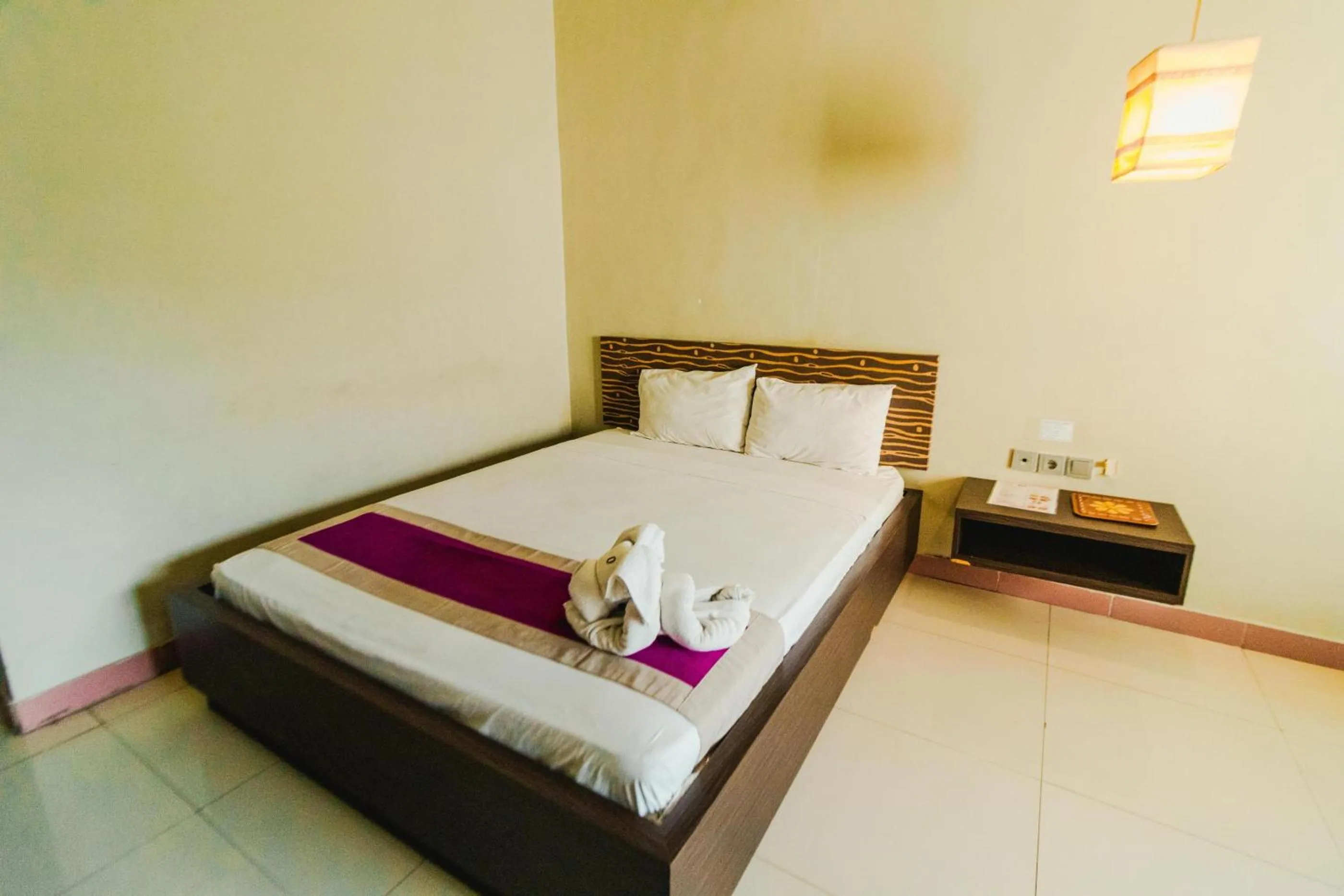 Bed in Bidari Hotel Lombok