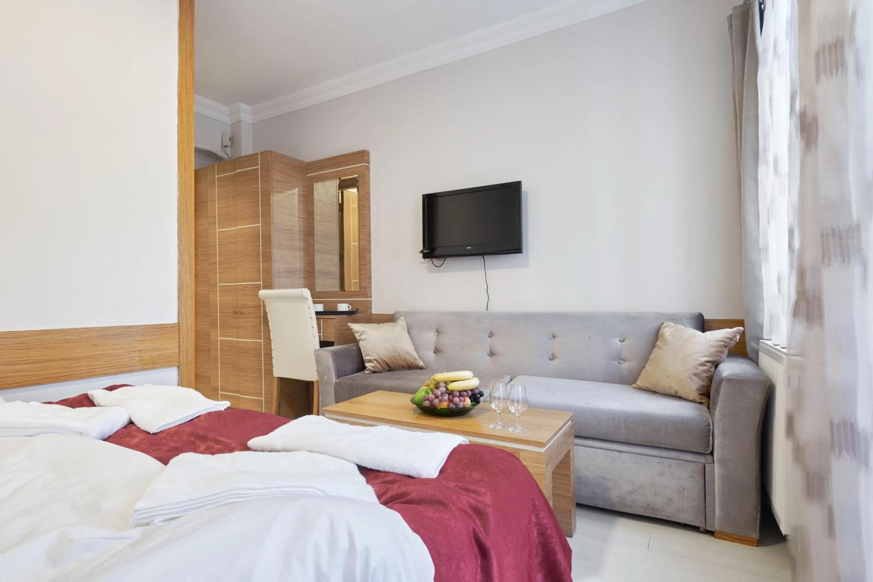 TV and multimedia, Bed in Central Suites Taksim