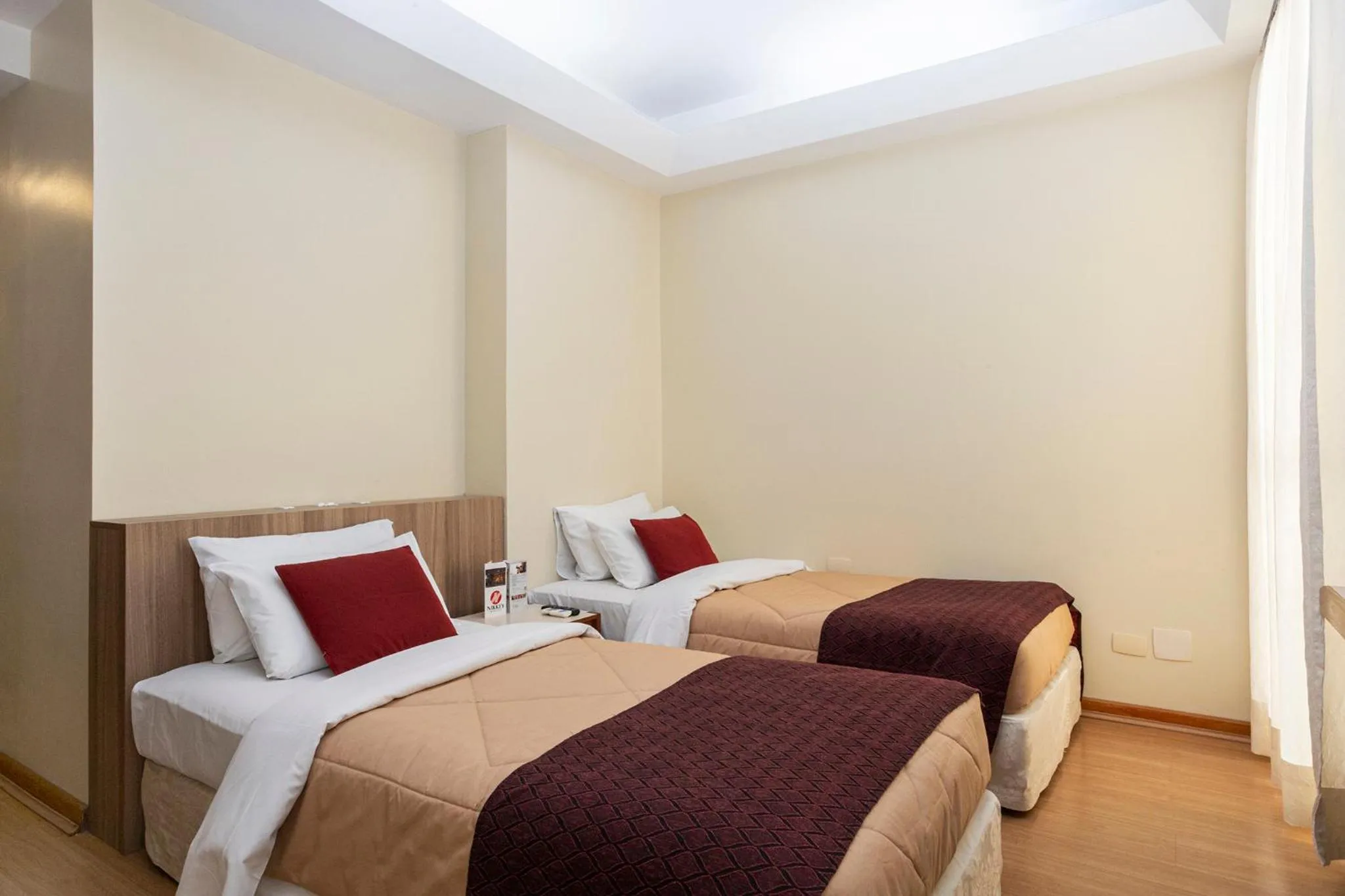 Bed in Nikkey Palace Hotel