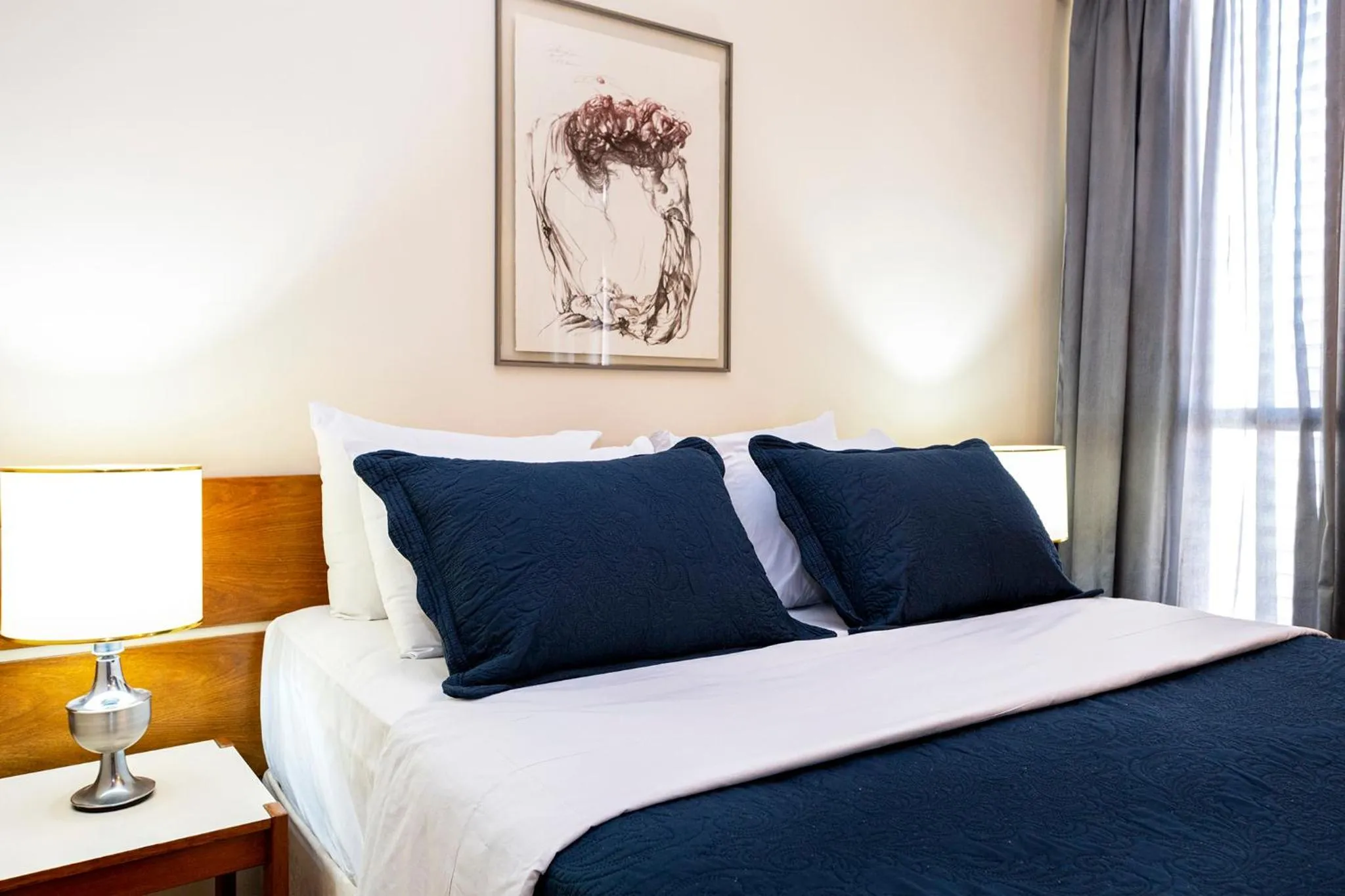 Bed in Nikkey Palace Hotel