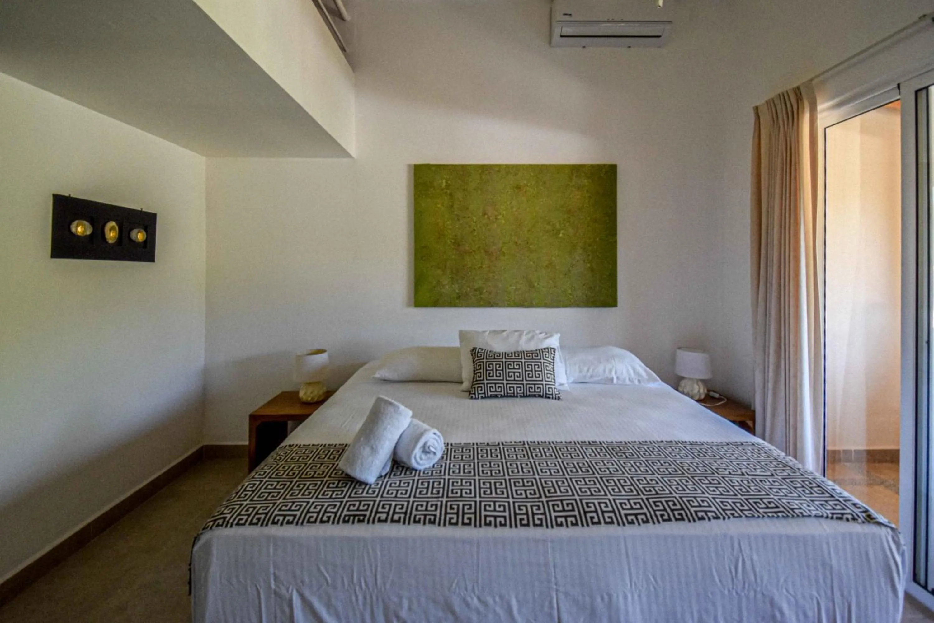 Bed in Montelaguna Boutique Hotel