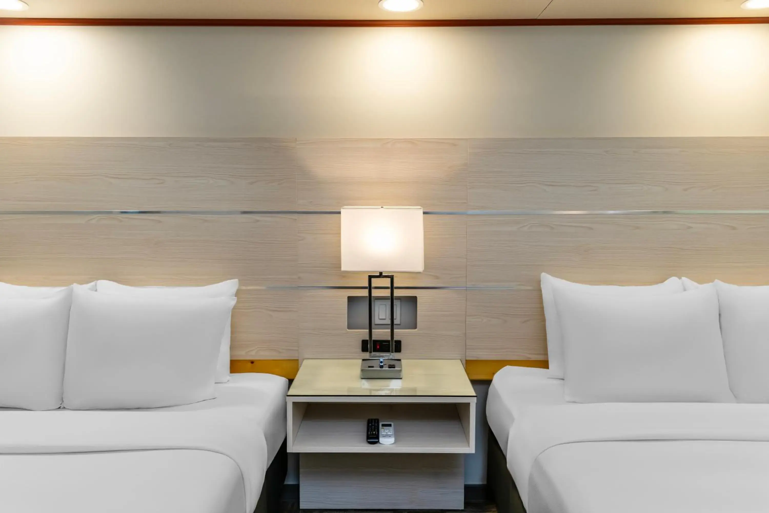 Quadruple Room with Two Queen Beds - Non Smoking in Quality Inn Sunshine Suites Quadruple Room with Two Queen Beds - Non Smoking in Quality Inn Sunshine Suites