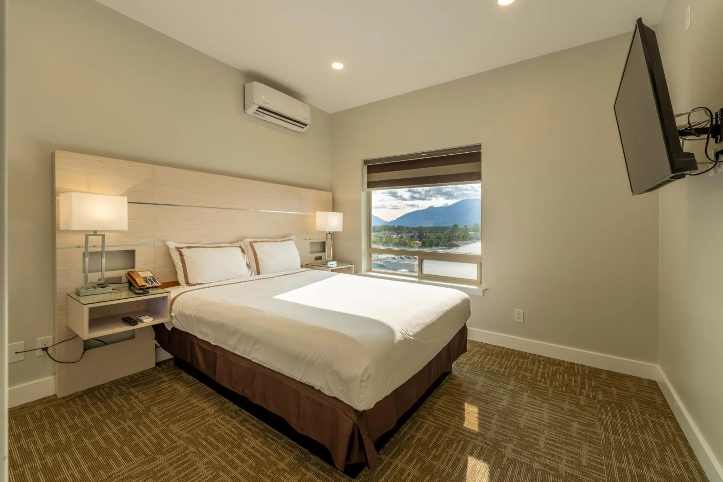 Bed in Quality Inn Sunshine Suites