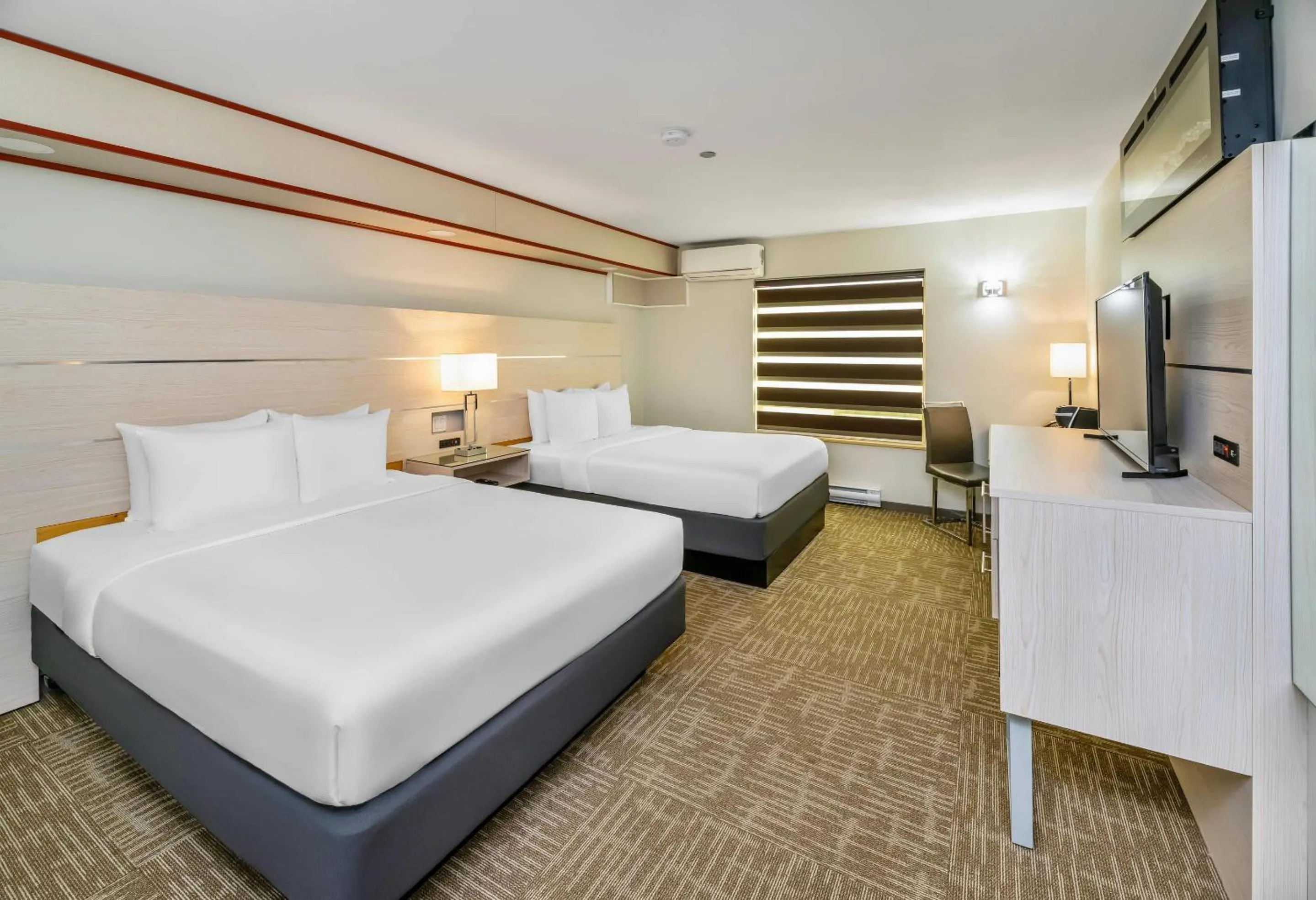 Bedroom, Bed in Quality Inn Sunshine Suites