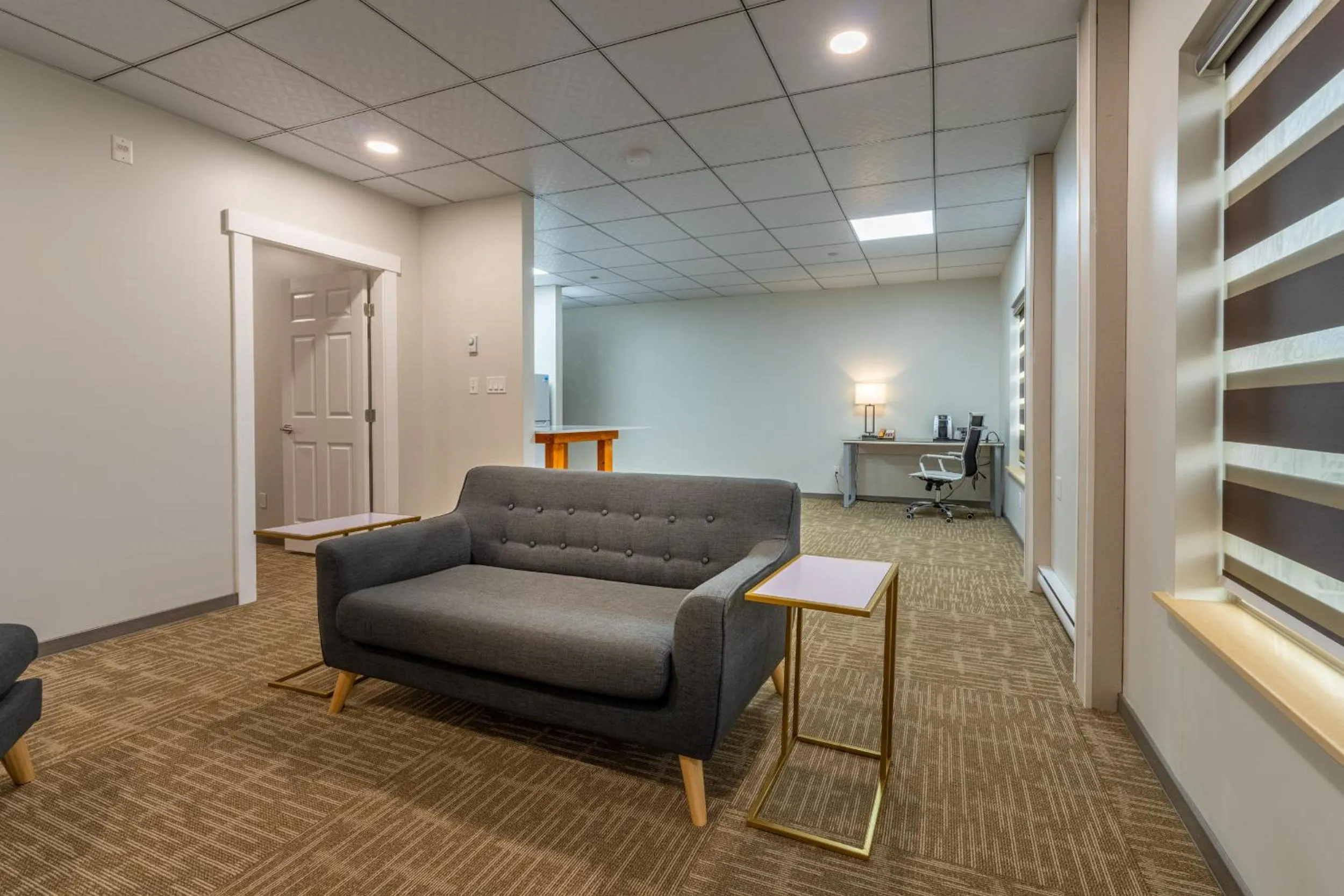 Living room in Quality Inn Sunshine Suites