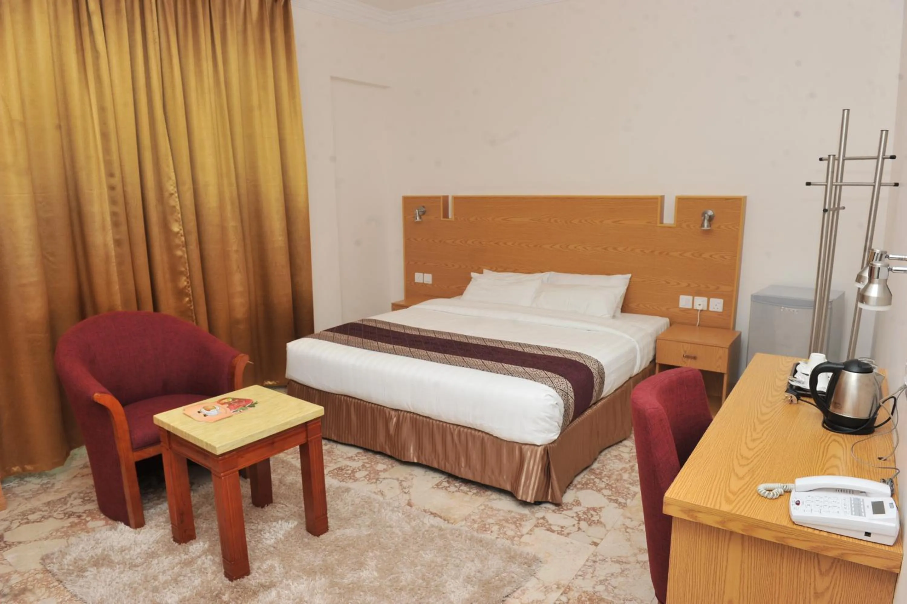 Bed in Al Reef Hotel