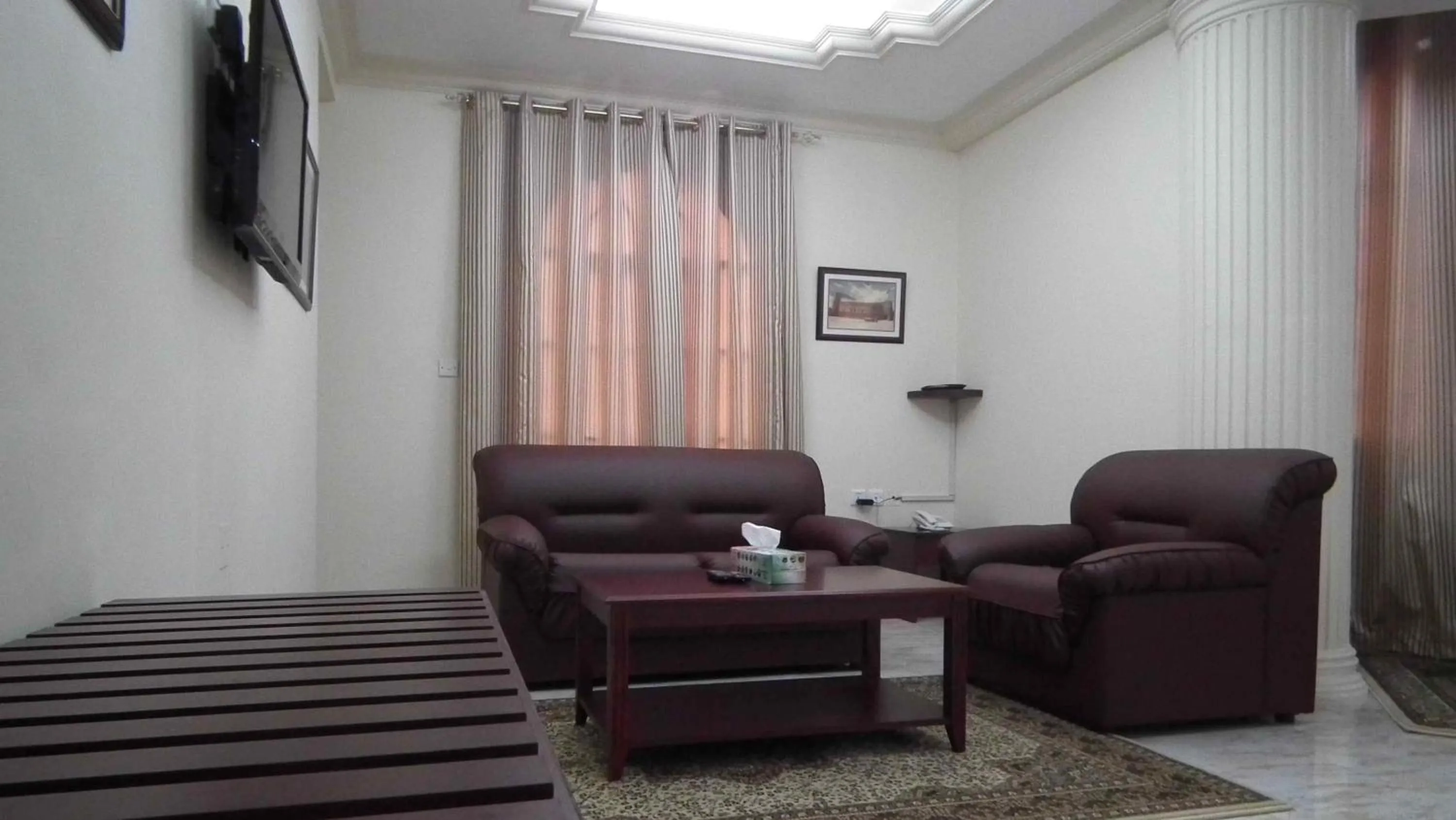Living room in Al Ferdous Hotel Apartments