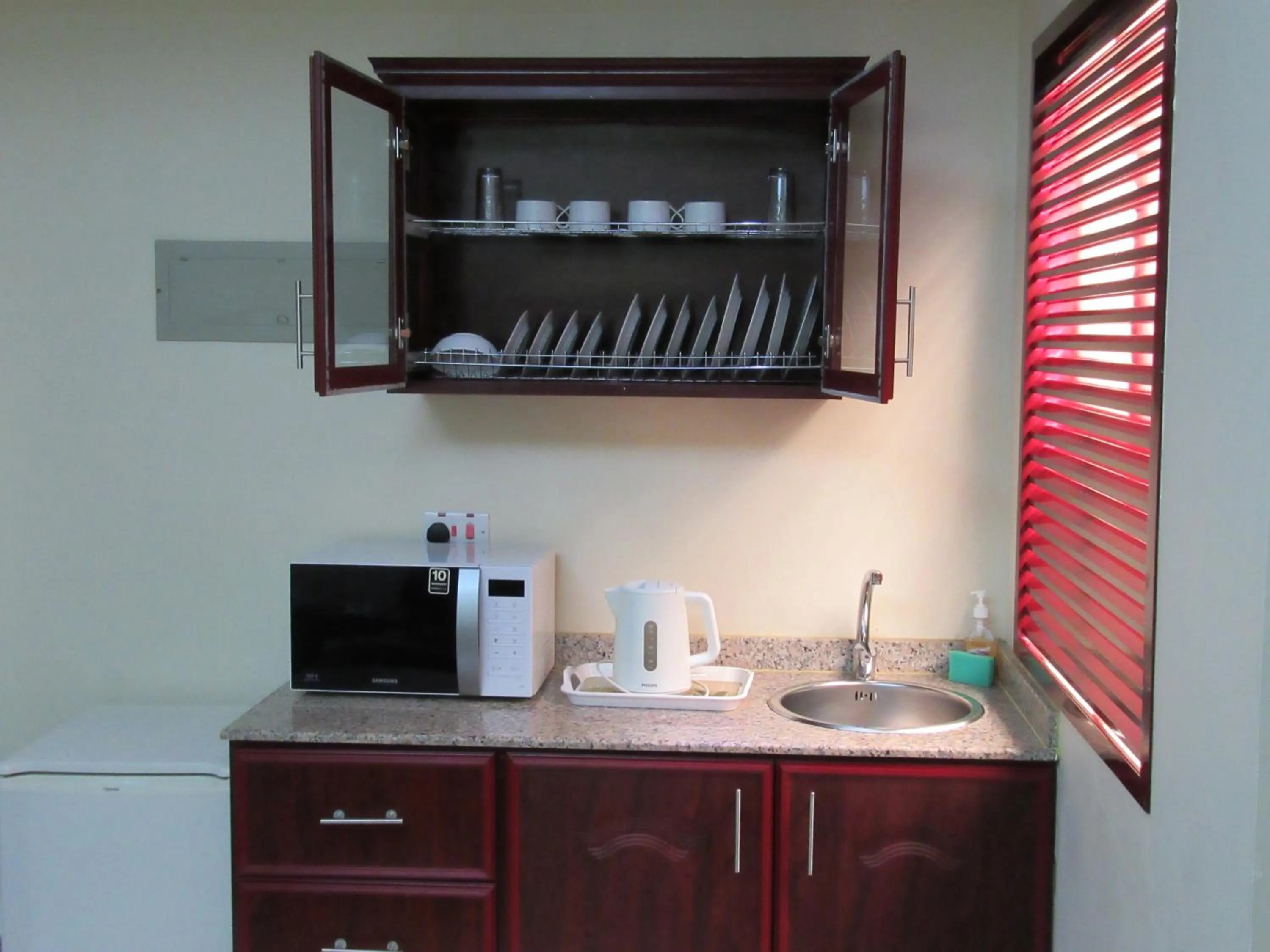 Kitchen or kitchenette in Al Ferdous Hotel Apartments